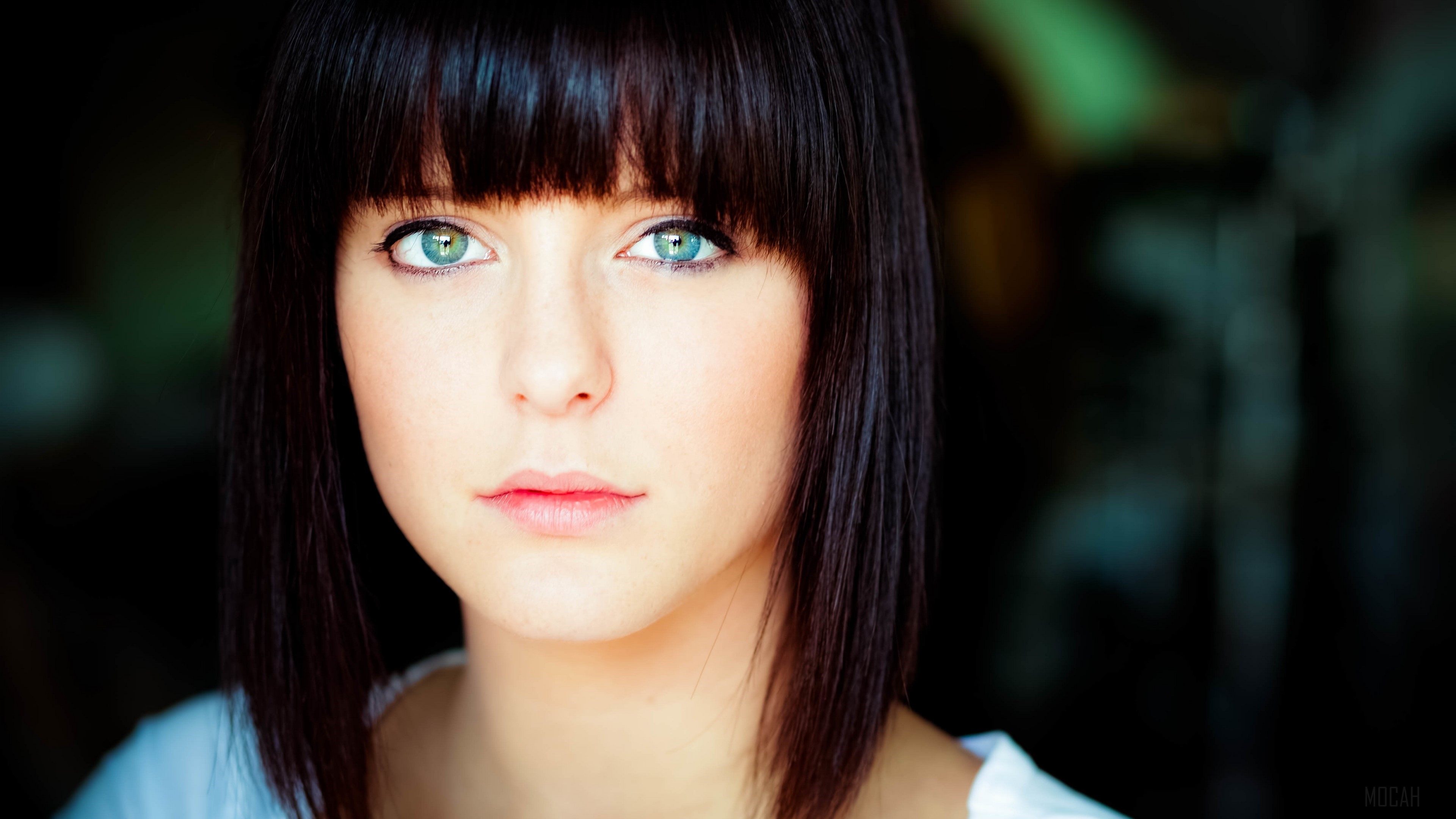 Portrait of Woman with Blue Eyes and Dark Hair 4K HD Wallpaper