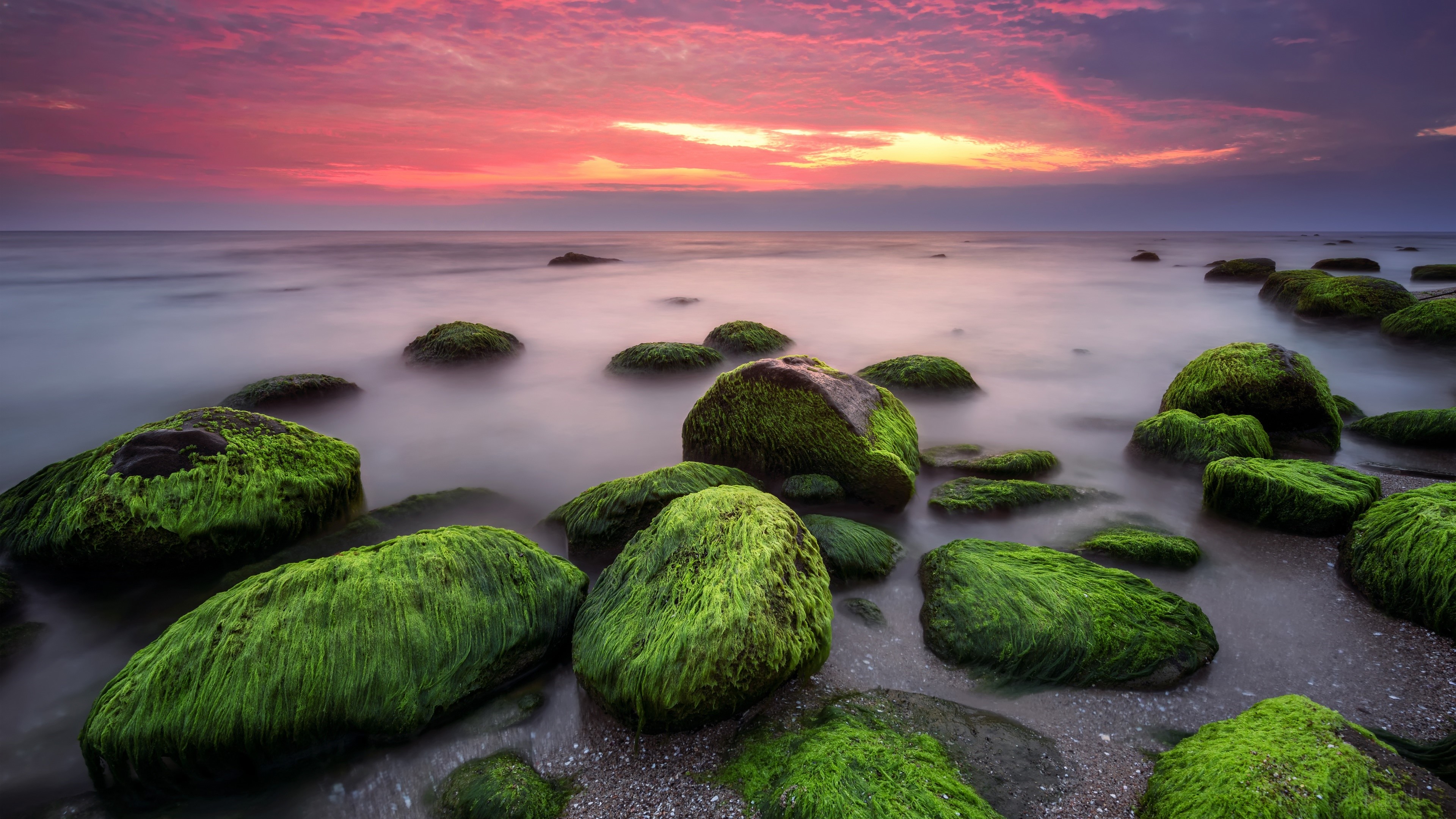 Mossy Rocks on a Beach at Sunset 4K HD Wallpaper