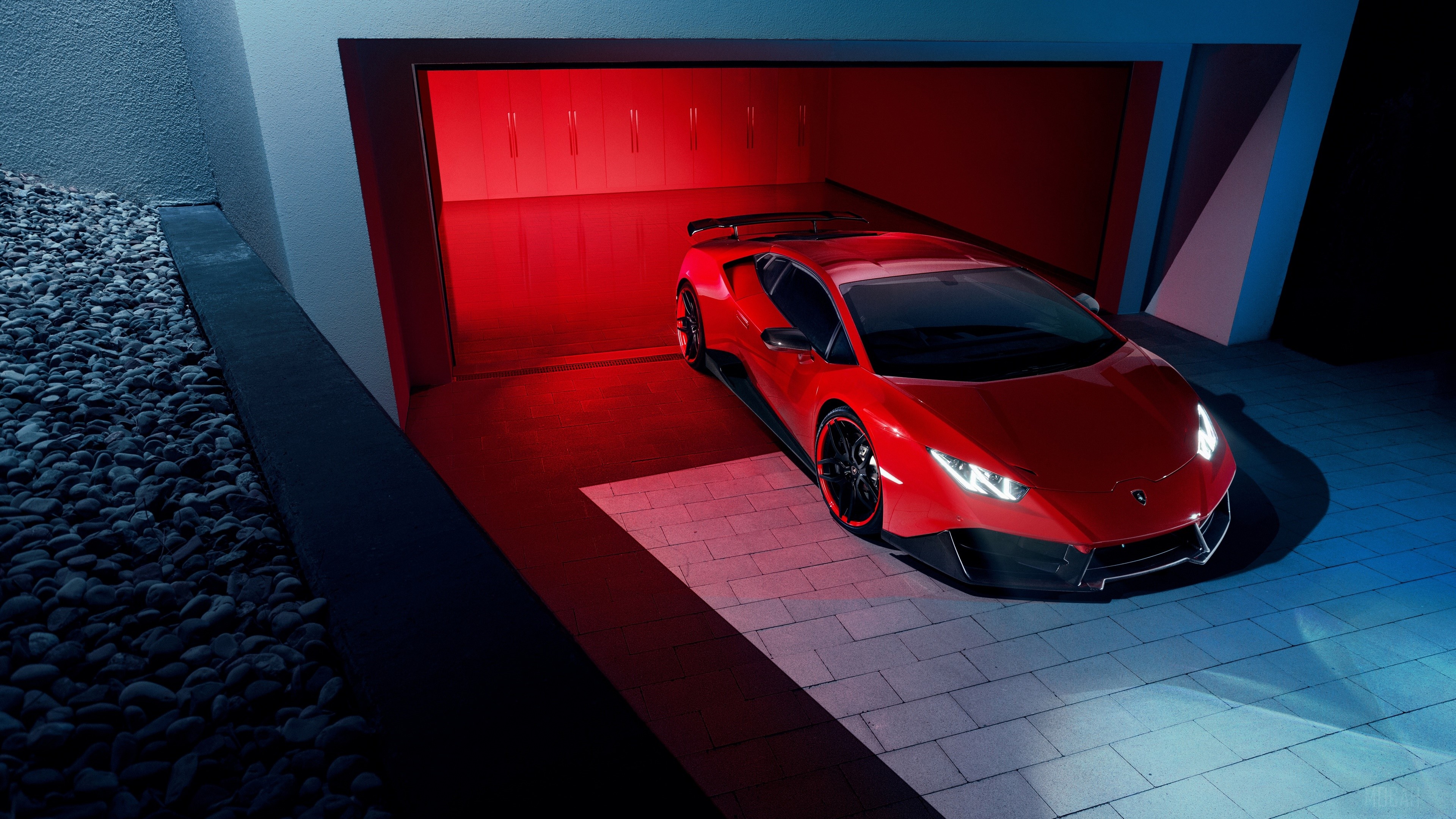 Red Lamborghini Huracan in a modern garage 4K HD Wallpaper