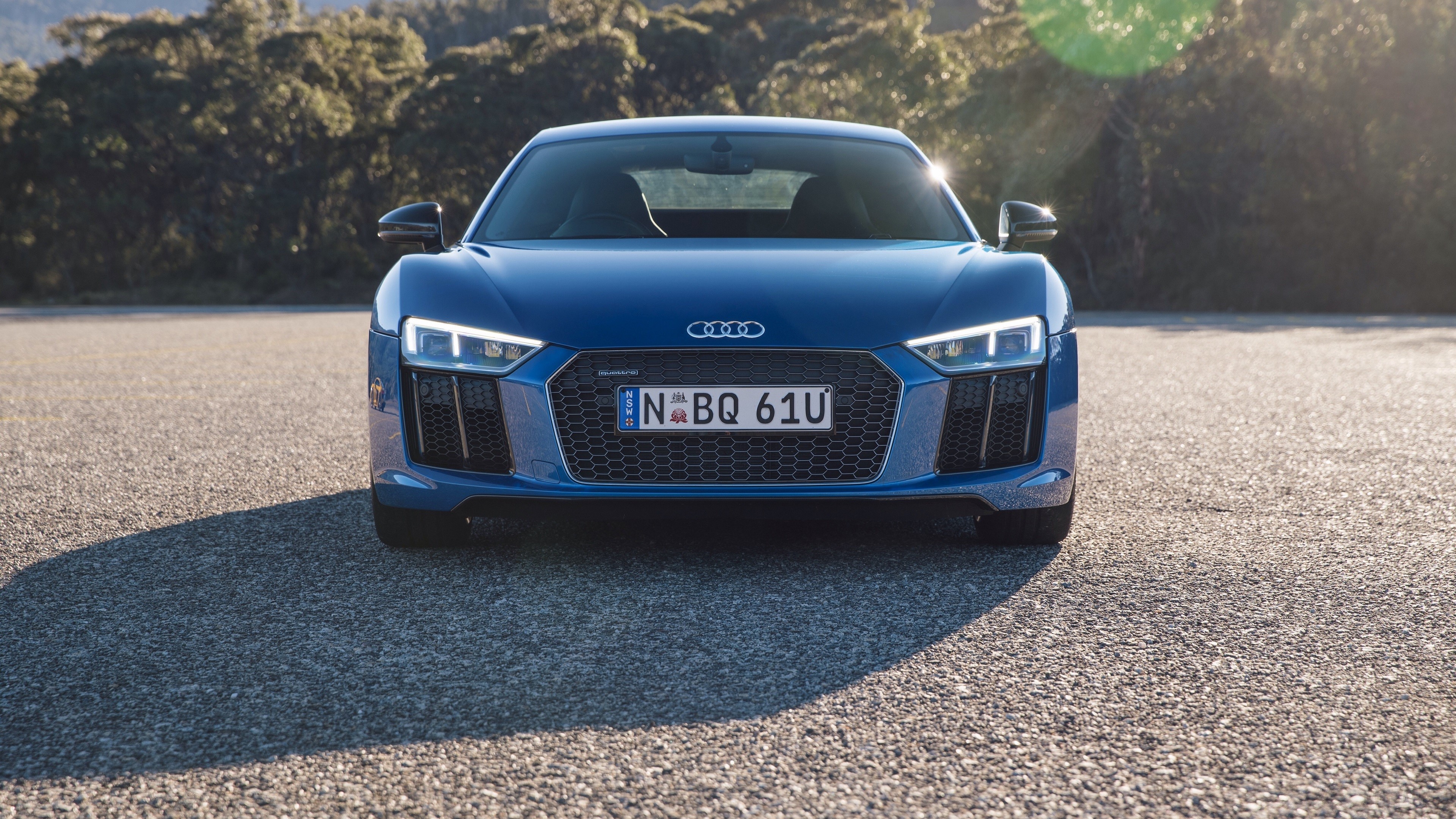 Blue Audi R8 V10 parked on asphalt HD Wallpaper