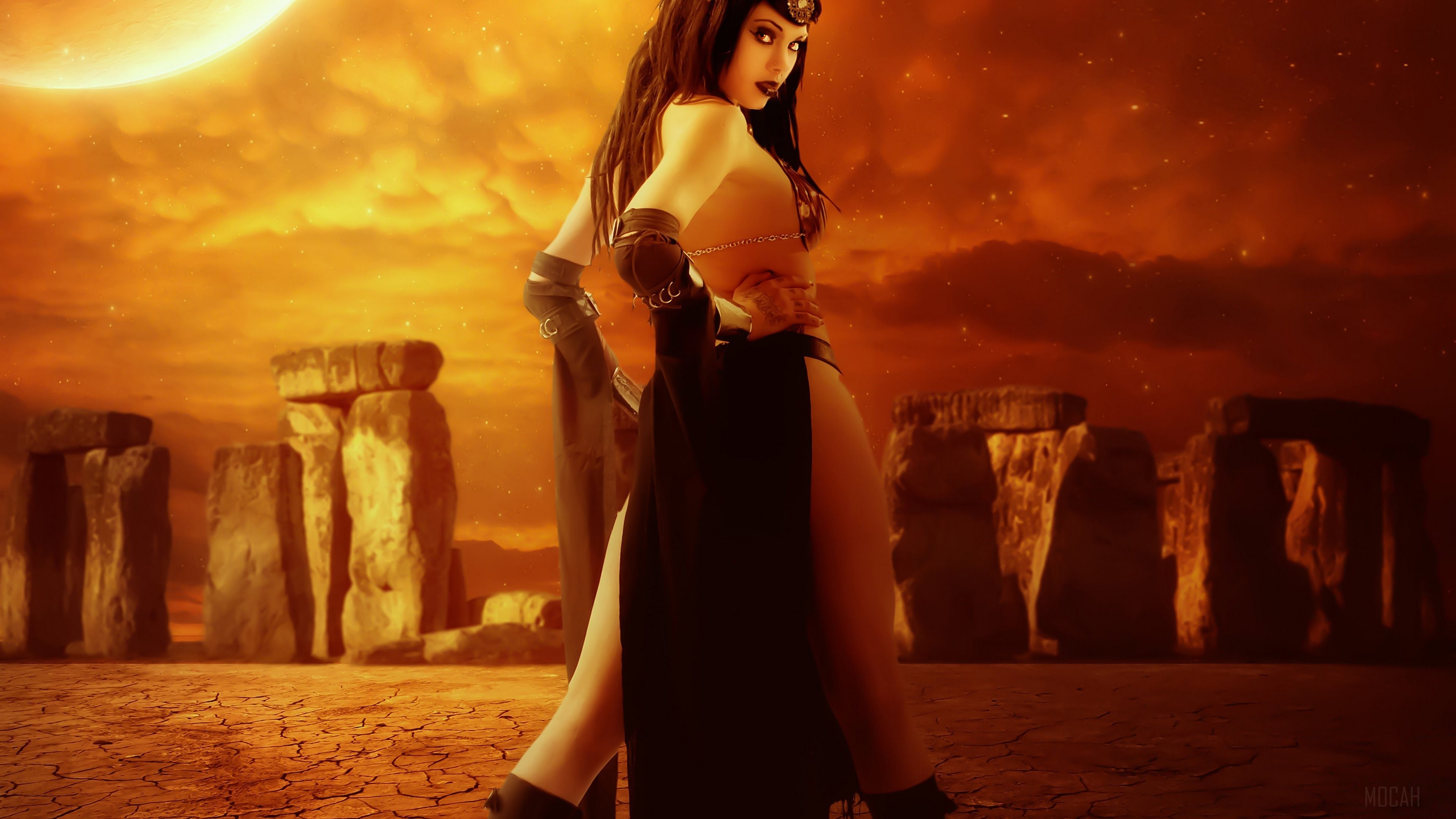 Fantasy woman in tribal attire at Stonehenge under a large moon HD Wallpaper