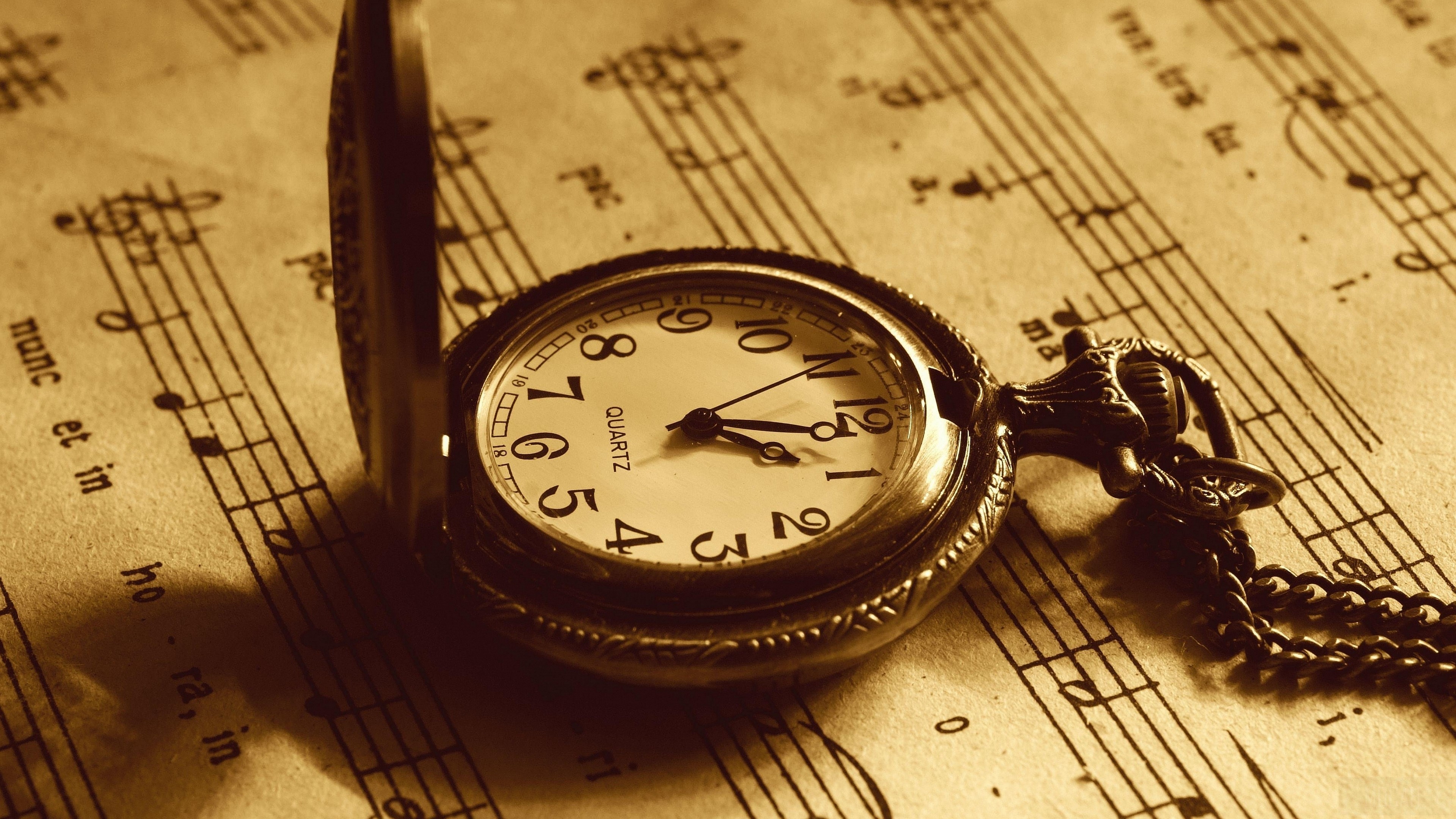 Pocket watch on sheet music HD Wallpaper