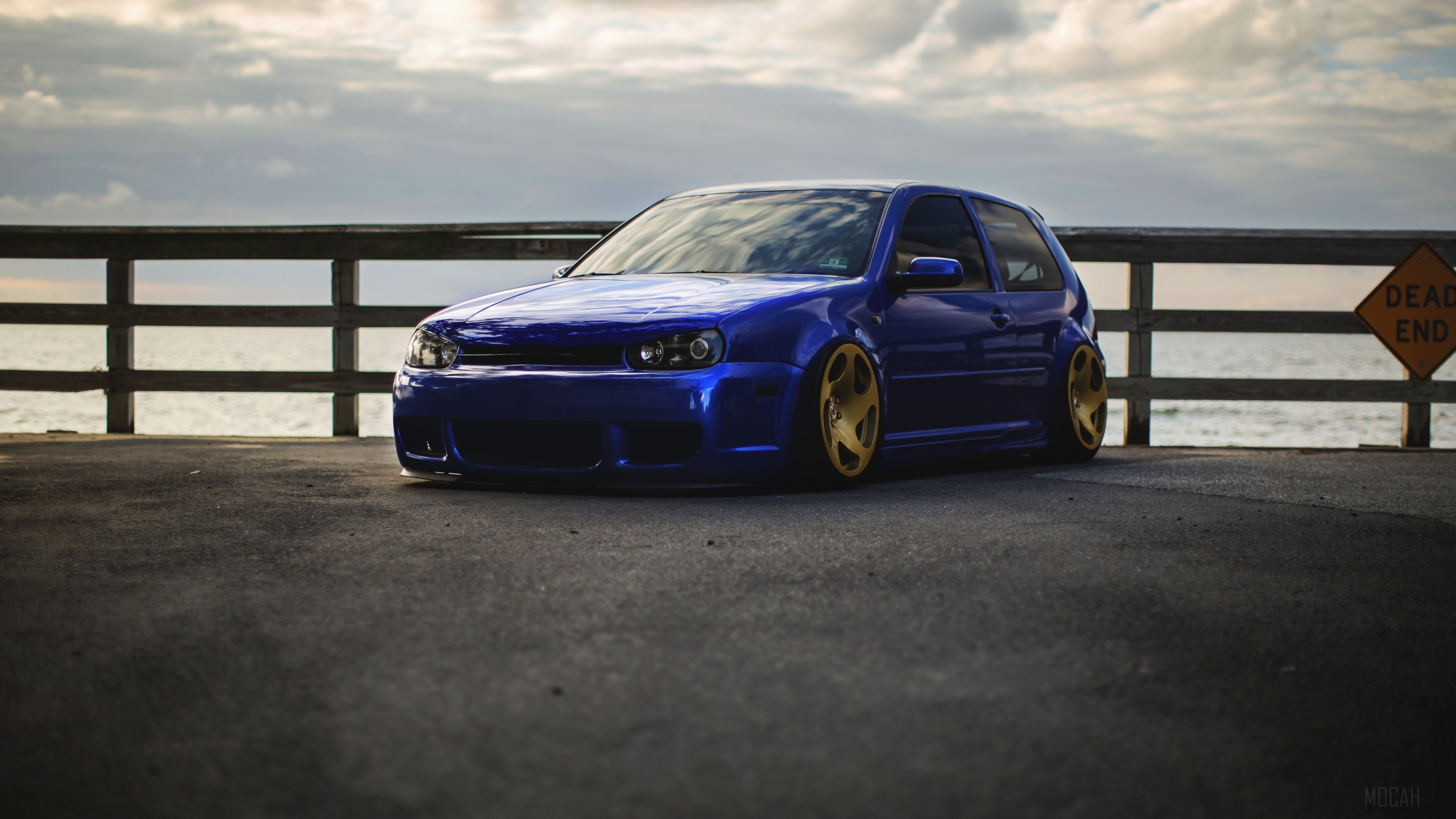 Blue Volkswagen Golf MK4 on a pier HD Wallpaper