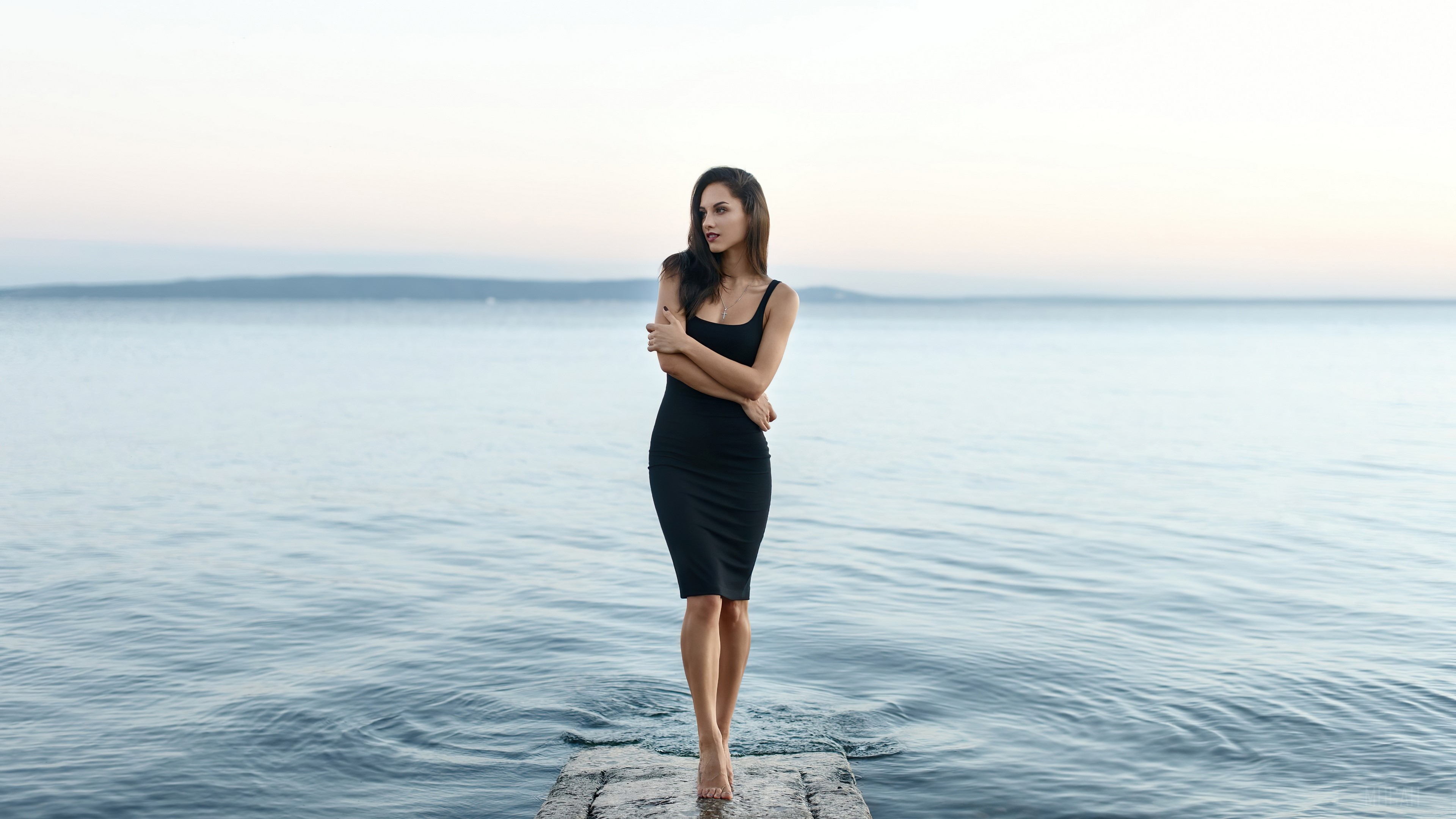 Brunette Woman in Black Dress by the Sea 4k HD Wallpaper