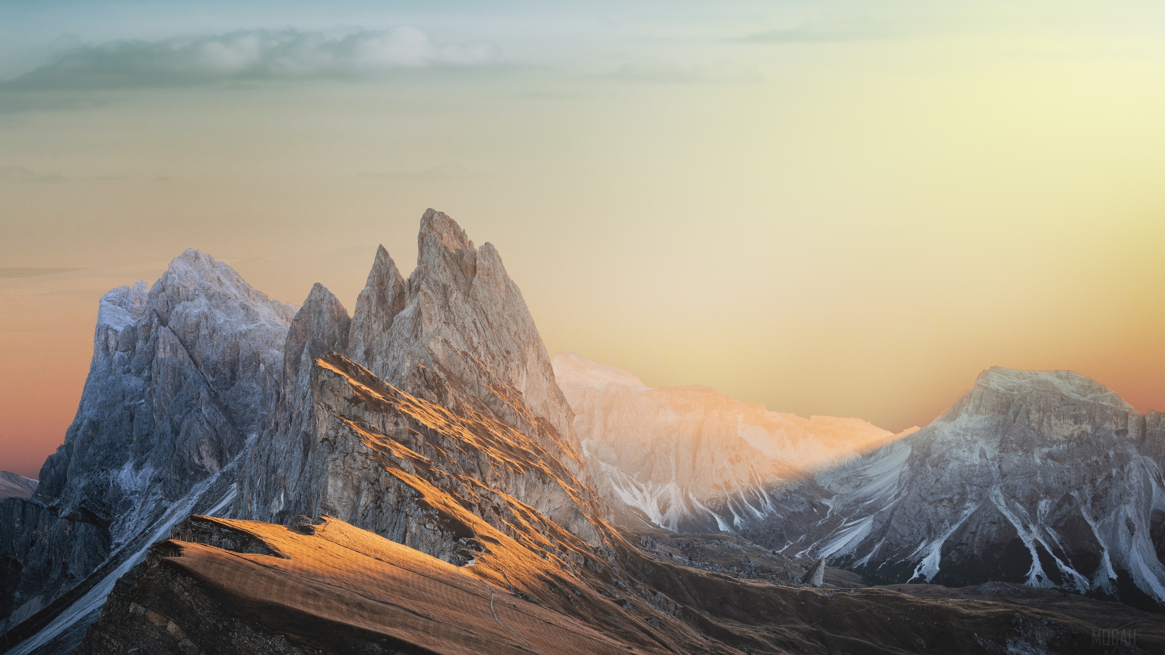 Sunbeam Illuminating Rugged Mountain Peaks 4K HD Wallpaper