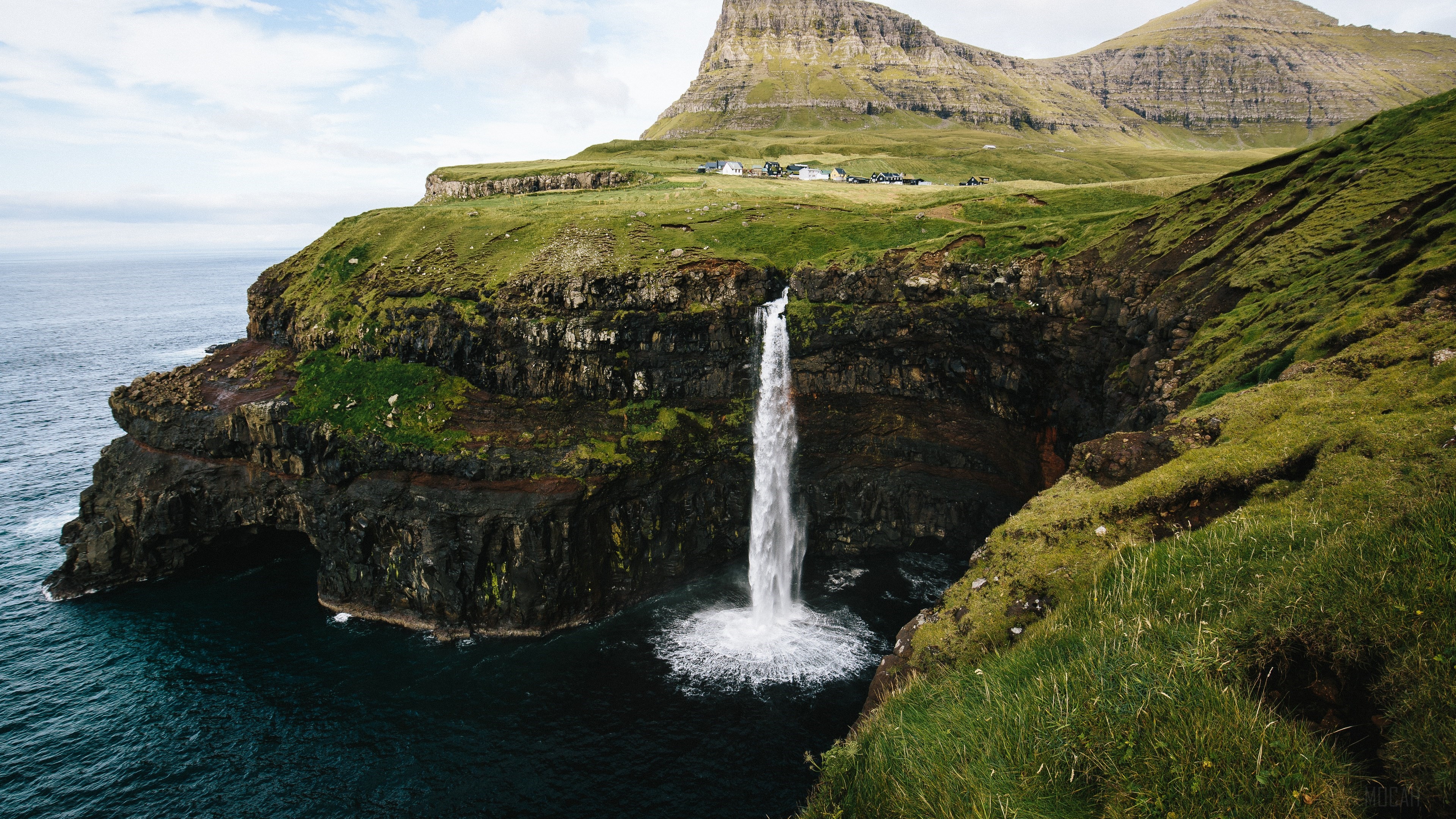 Waterfall on a cliff in the Faroe Islands 4K HD Wallpaper