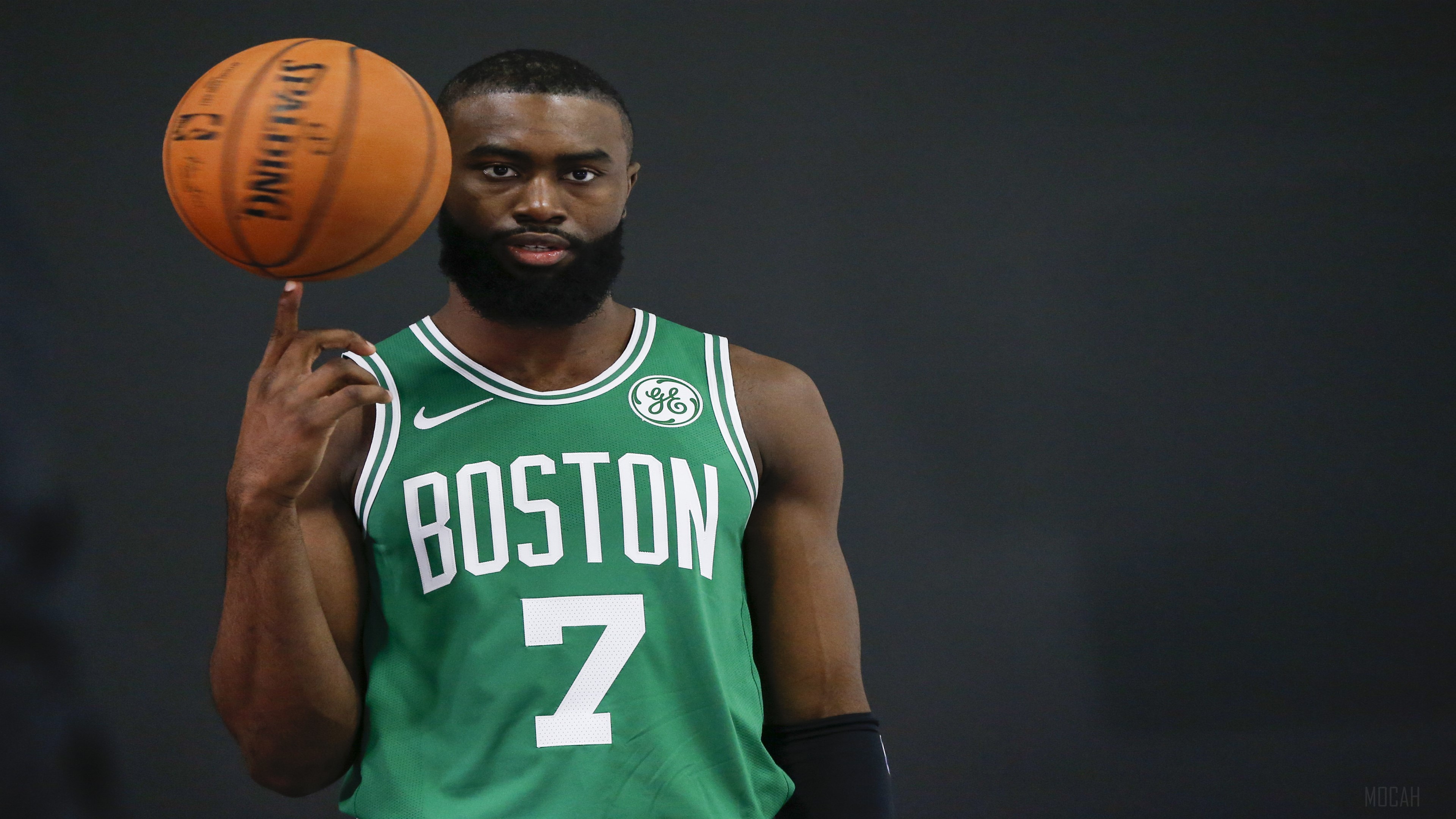 Jaylen Brown from Boston Celtics spinning a basketball HD Wallpaper
