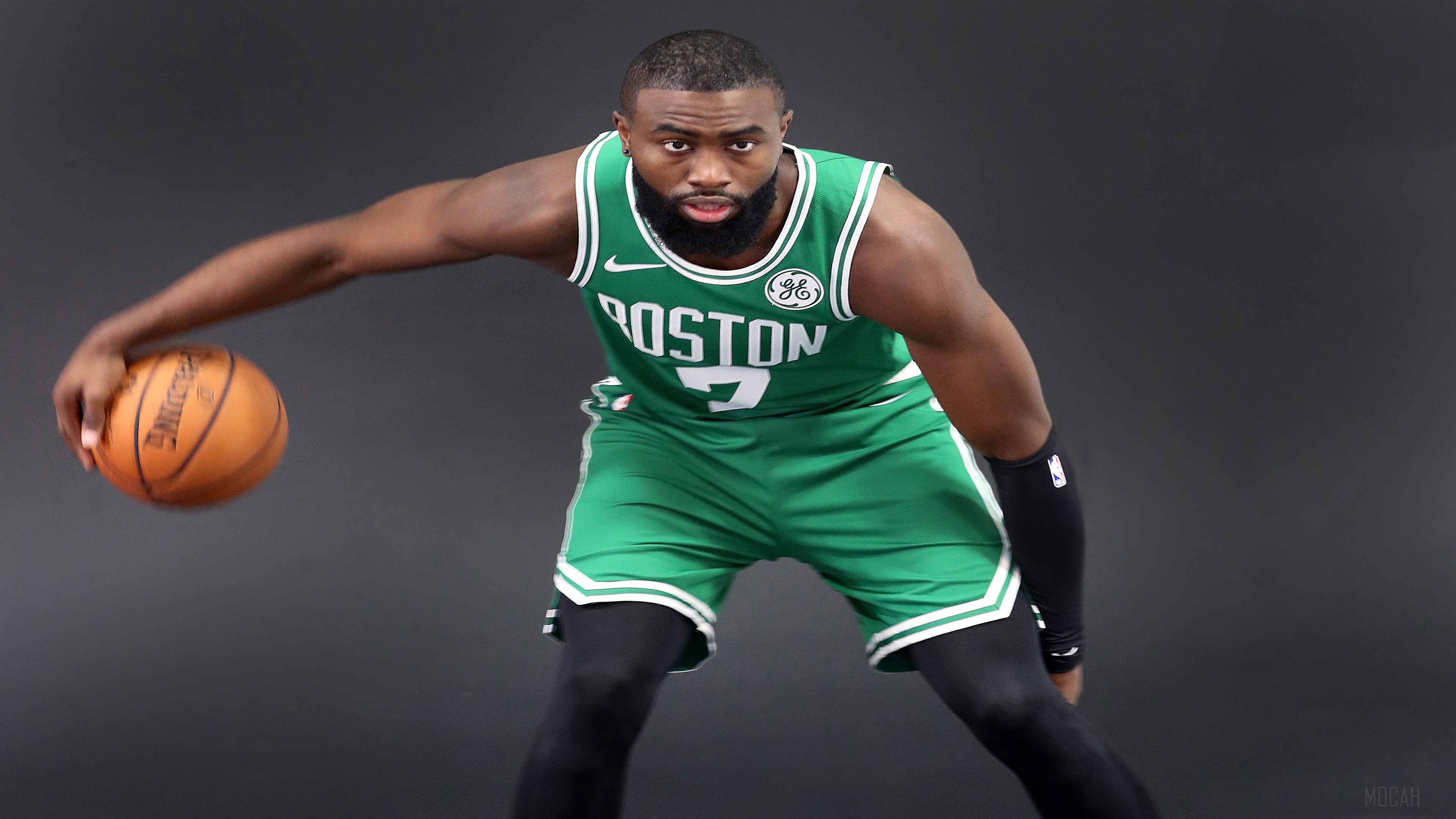 Jaylen Brown from Boston Celtics dribbling a basketball HD Wallpaper