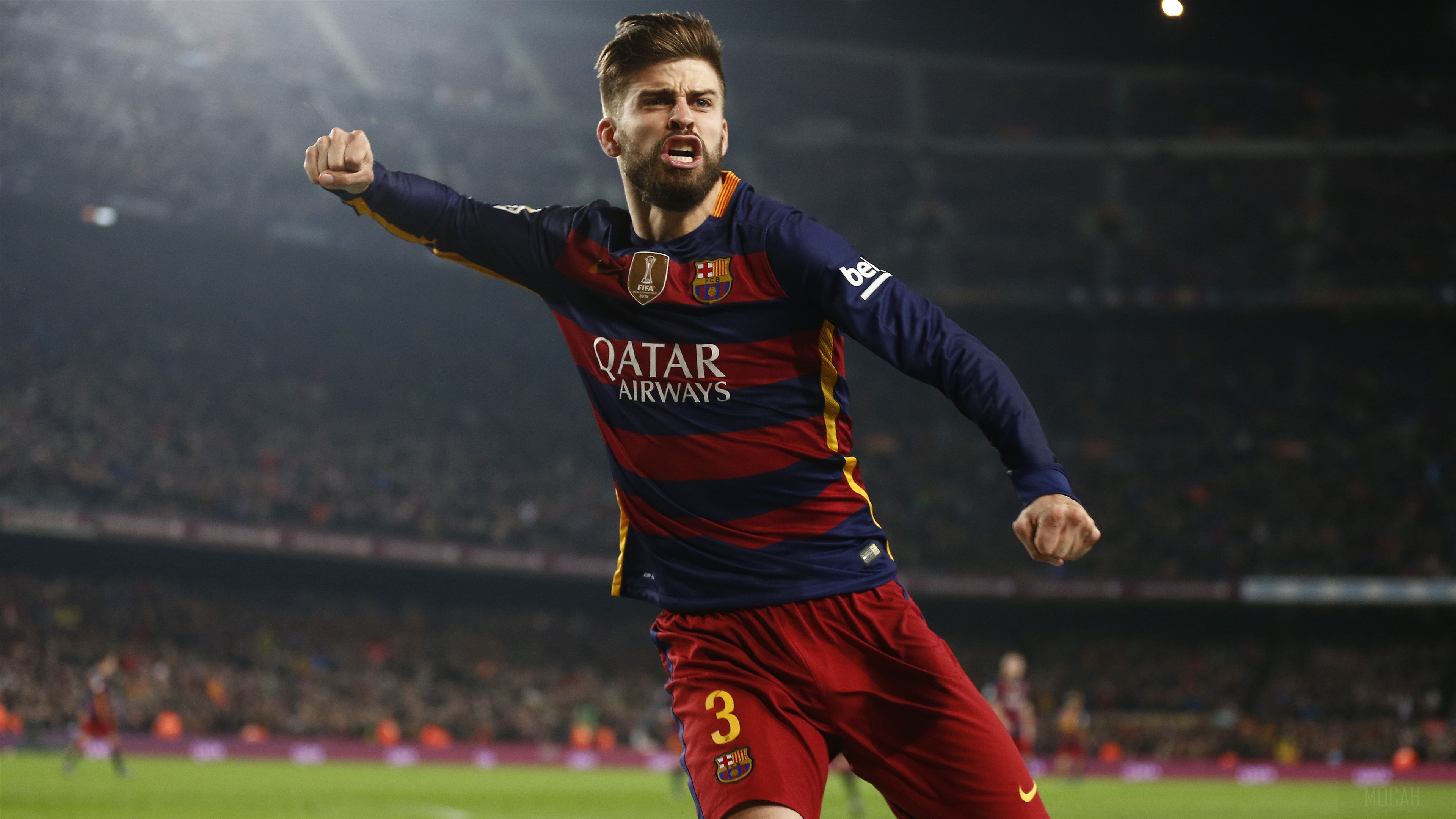 Gerard Pique celebrating a goal in a Barcelona kit HD Wallpaper