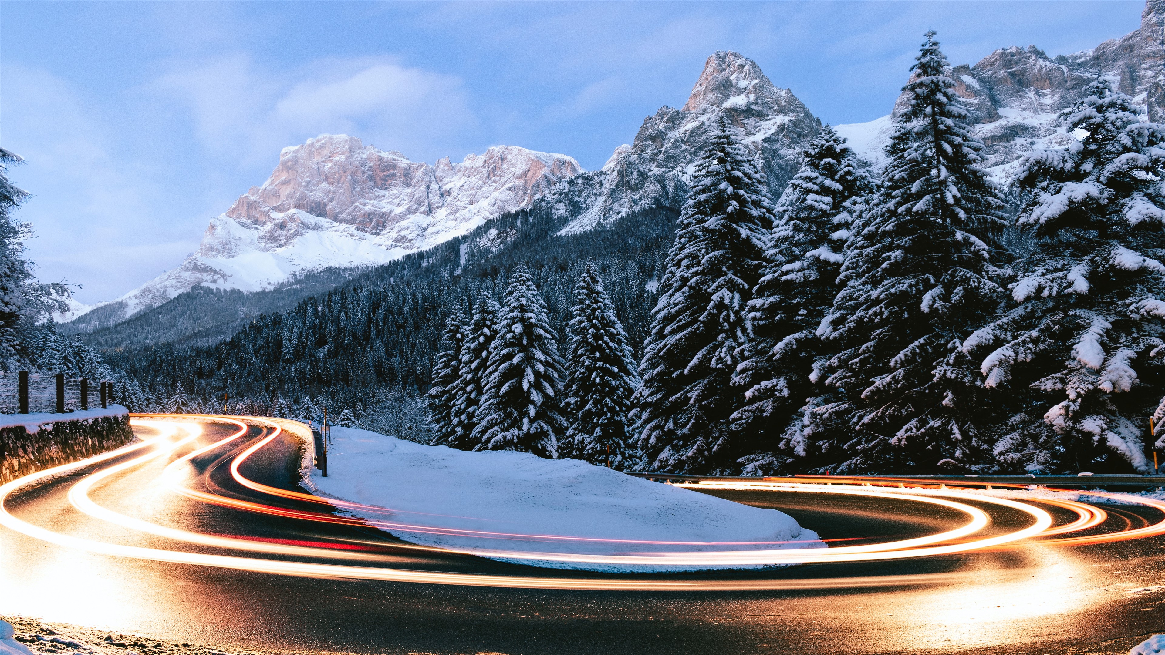 Long Exposure Winter Road with Snow-Covered Mountains HD Wallpaper