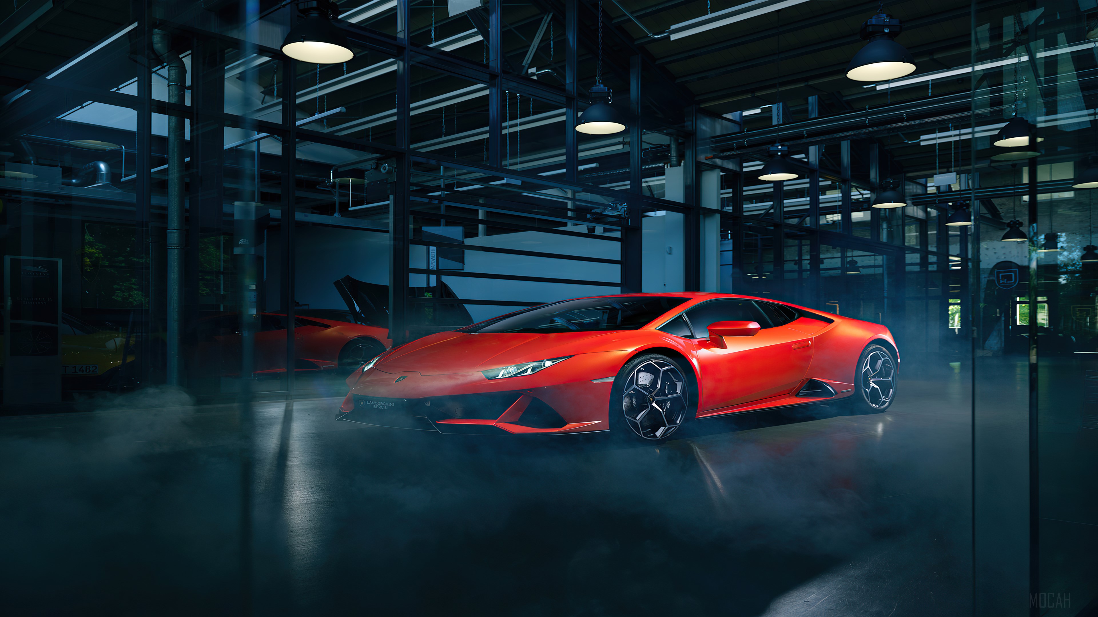 Orange Lamborghini Huracan in a garage HD Wallpaper