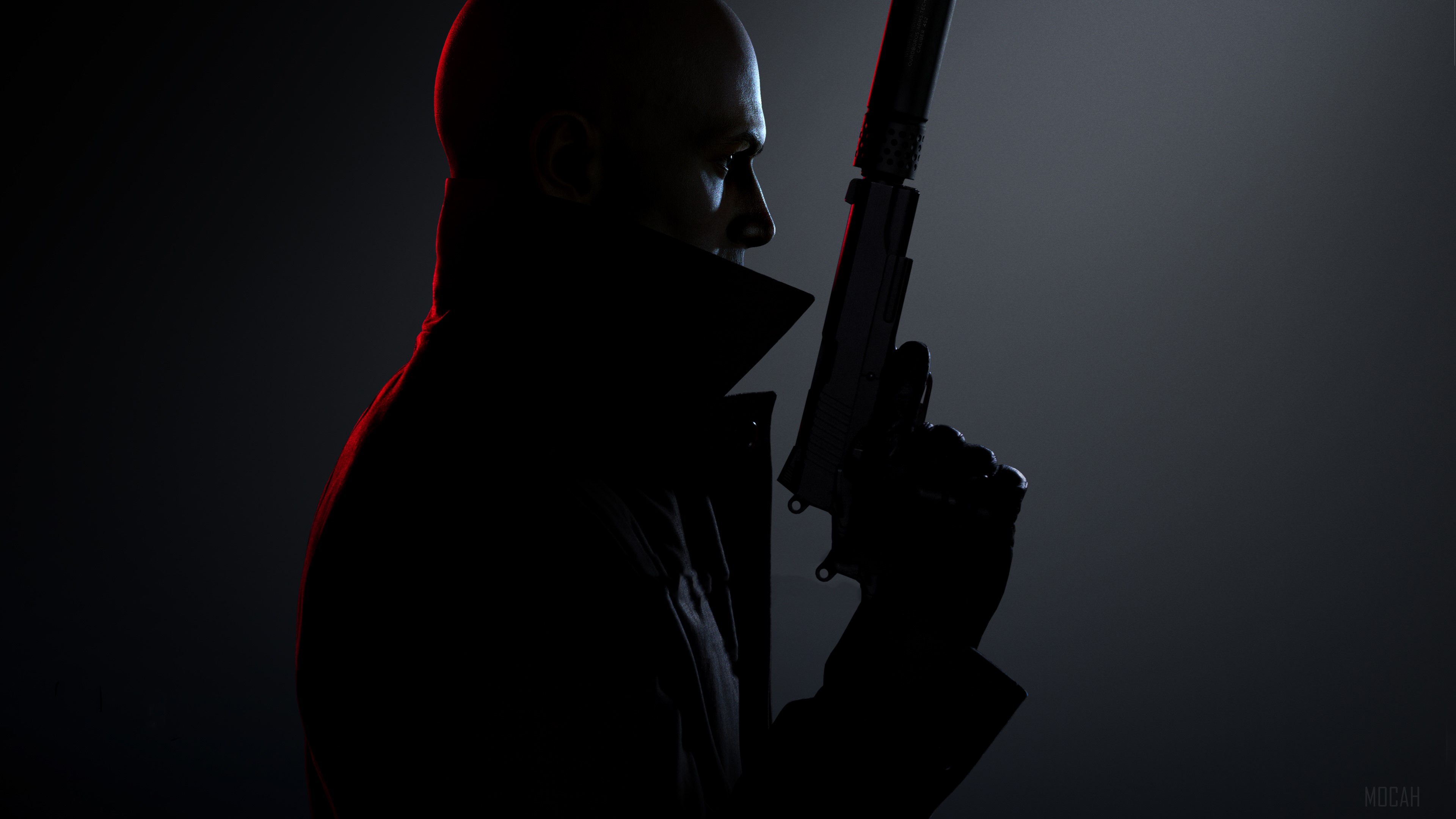 Agent 47 from Hitman 3 holding a silenced pistol HD Wallpaper