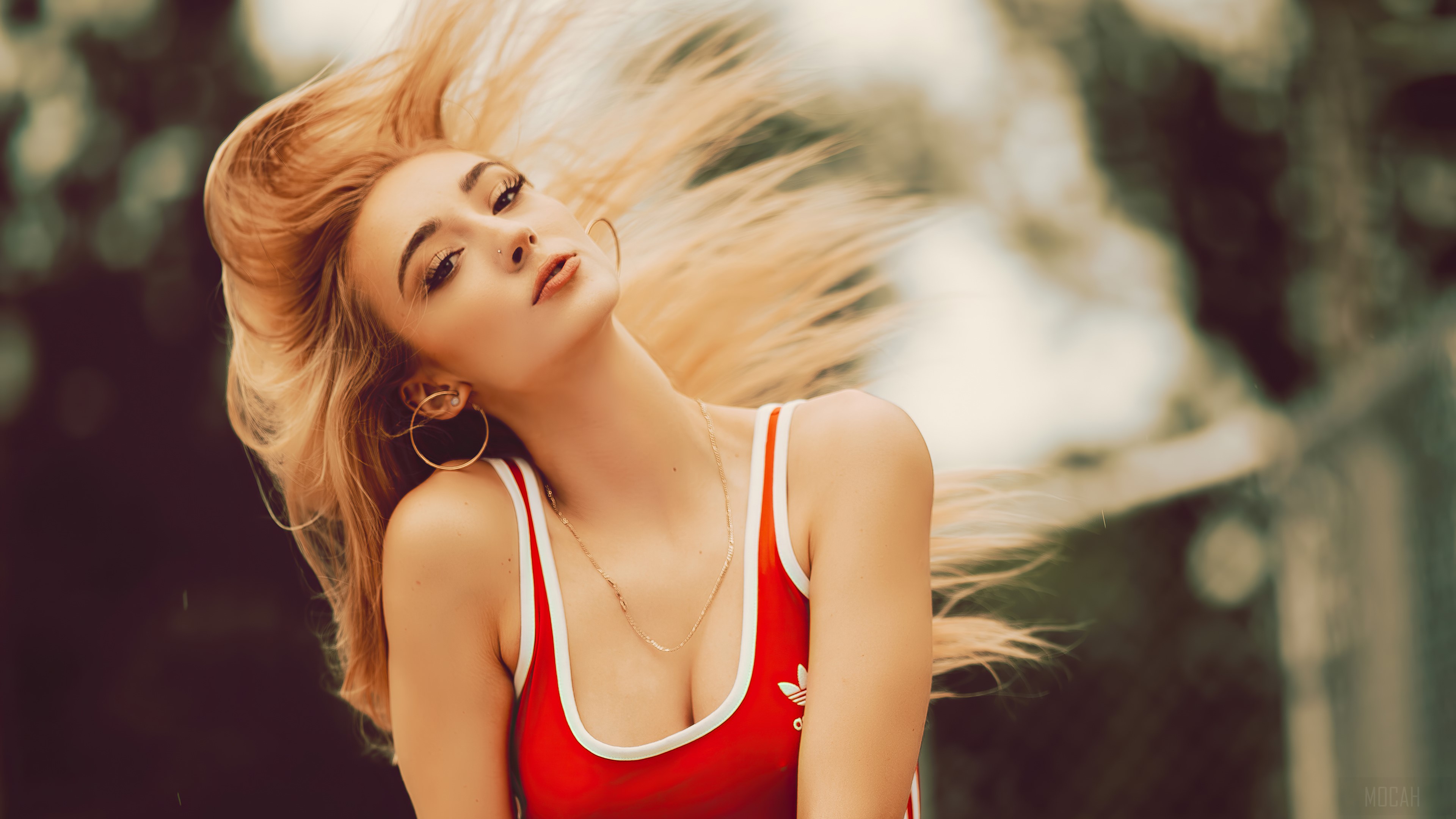 Girl with blonde hair moving outdoors 4K HD Wallpaper
