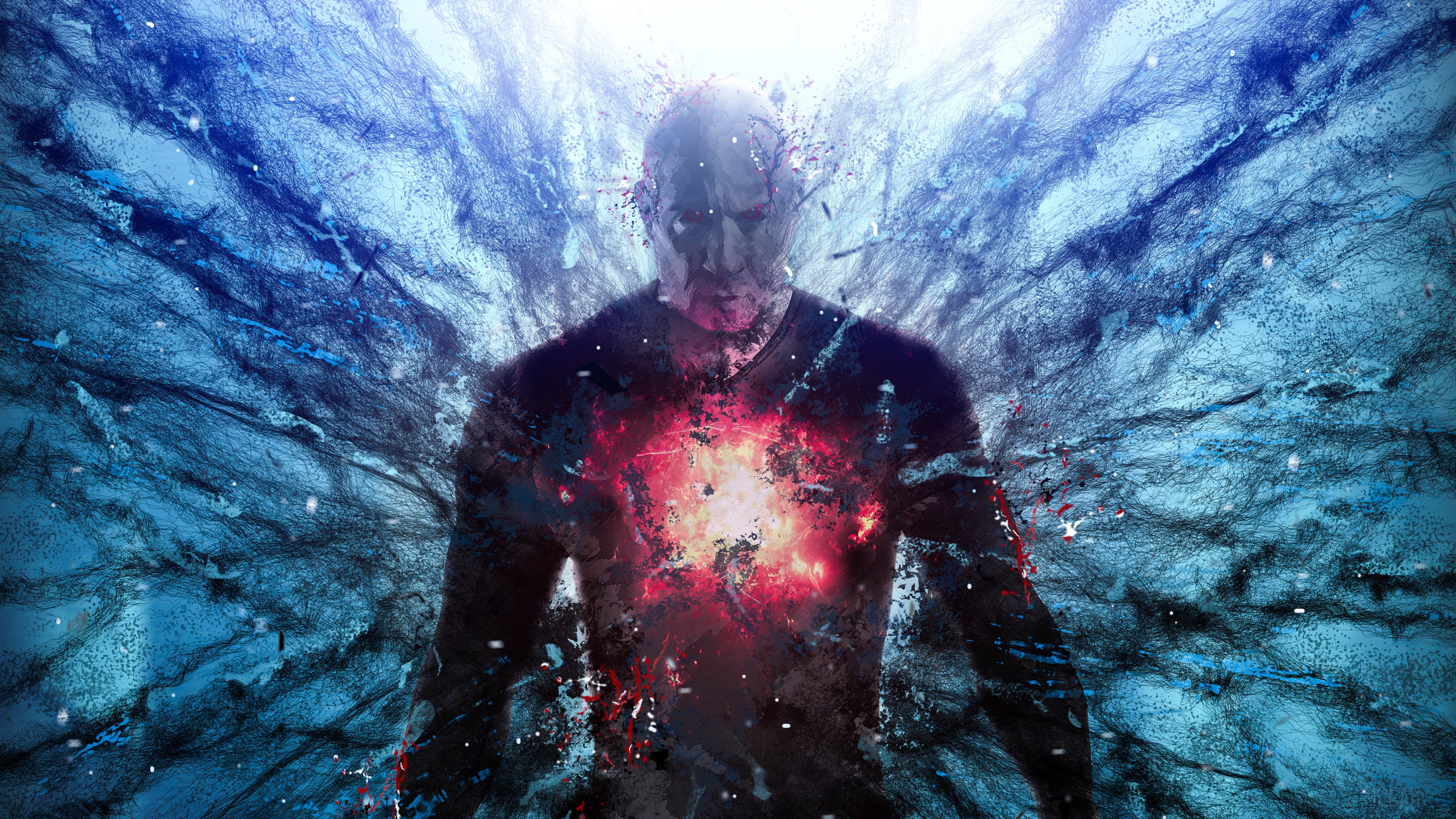 Man exploding with red energy and blue particles HD Wallpaper