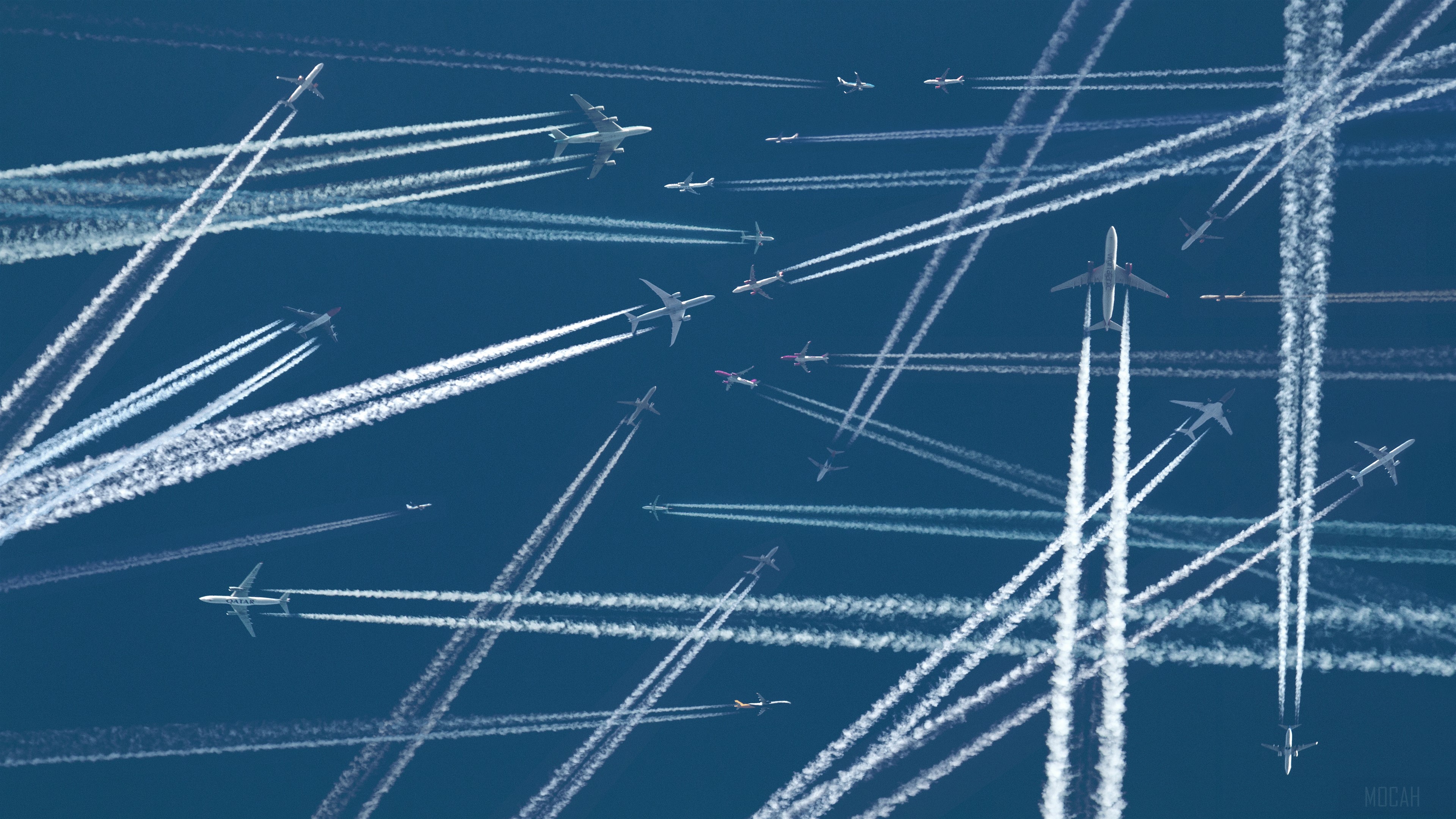 Planes leaving contrails in the sky 4K HD Wallpaper