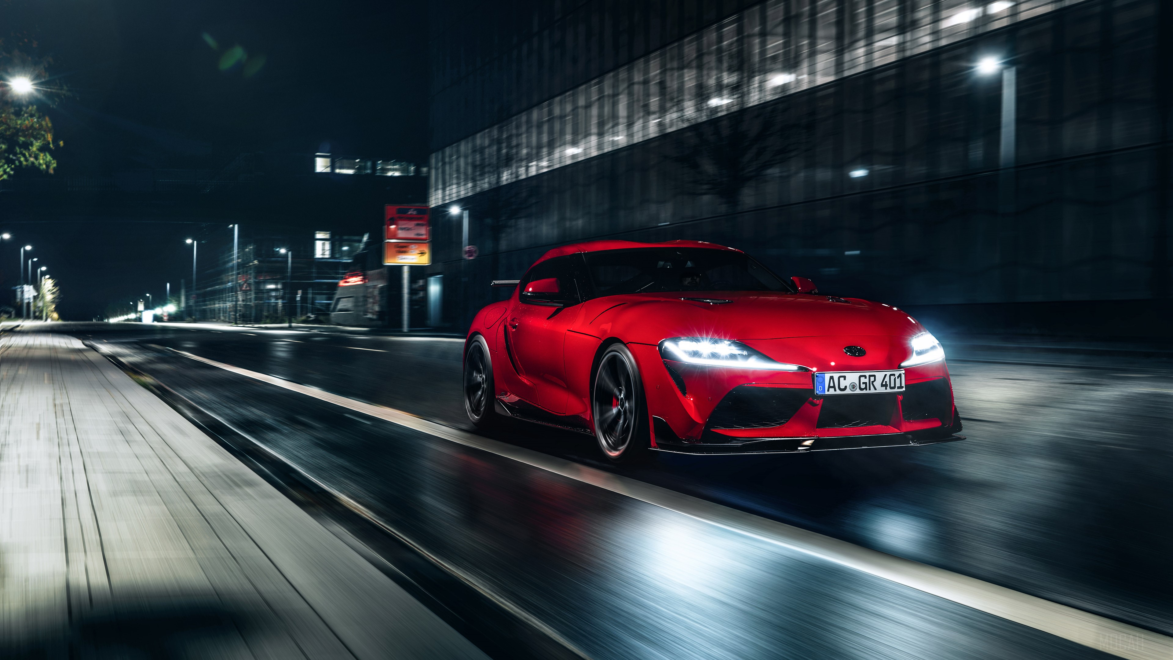 Red Toyota Supra 2020 driving at night HD Wallpaper