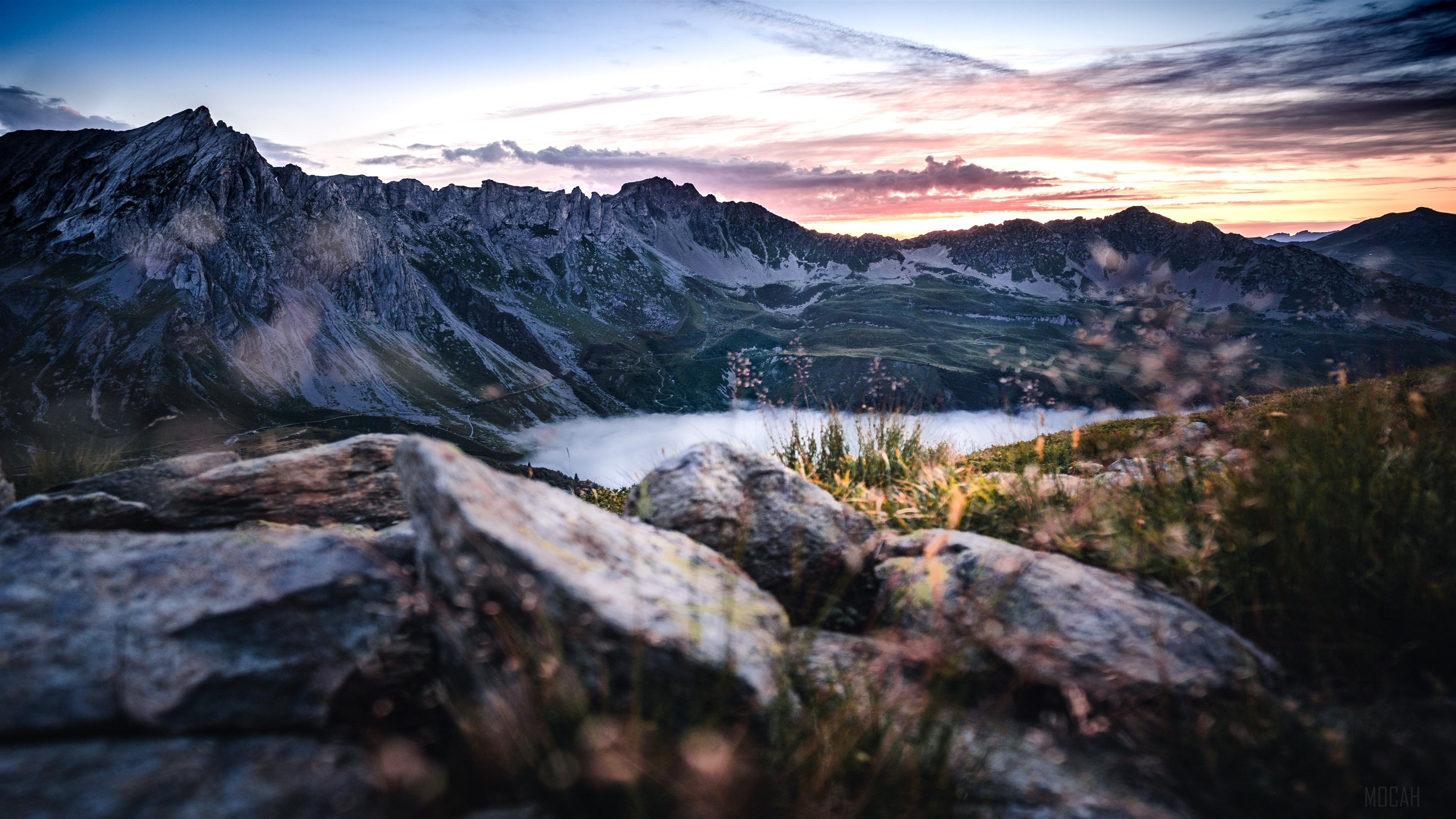 Mountain range with clouds at sunset 4K HD Wallpaper