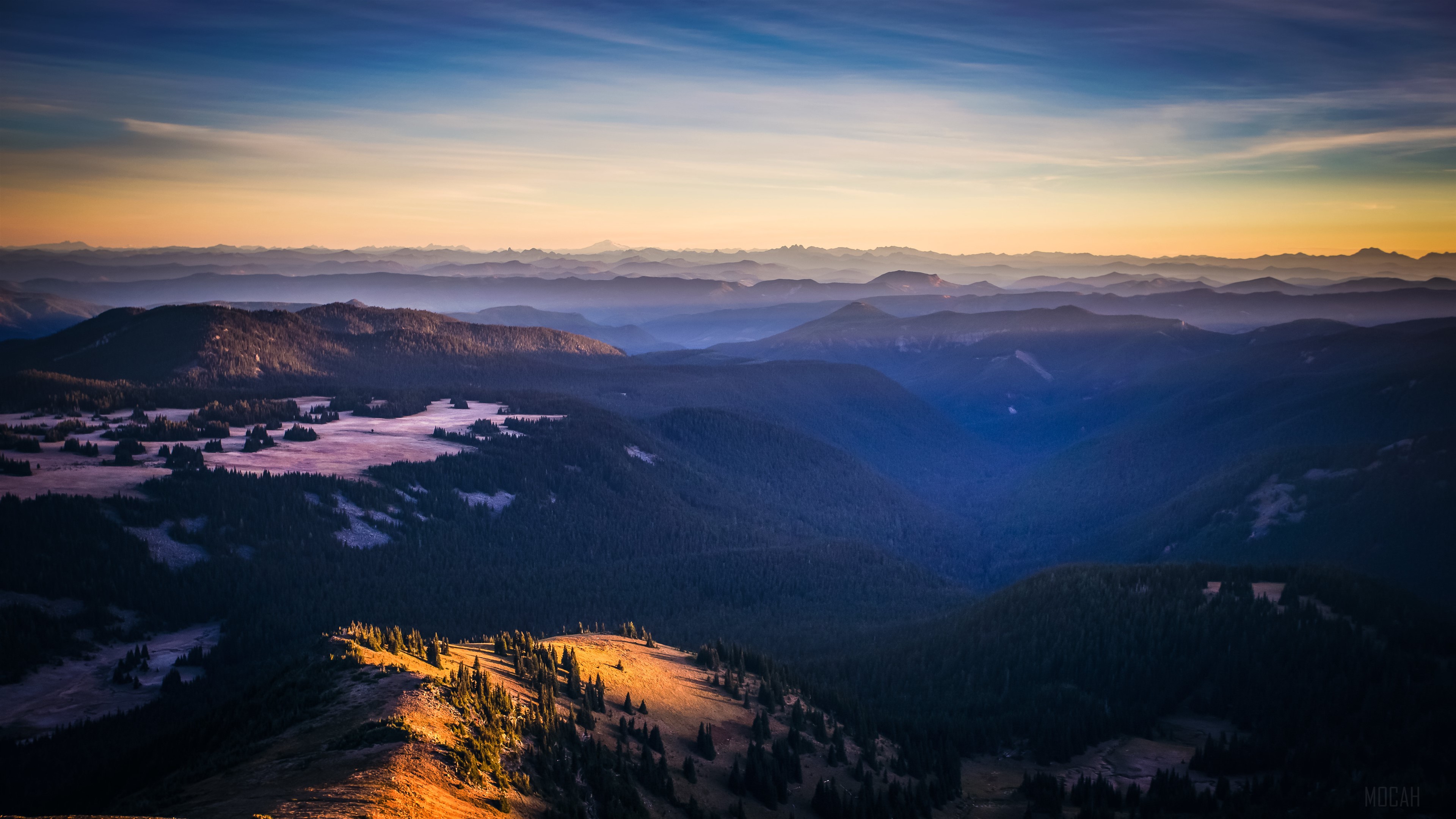 Sunrise over mountain ranges HD Wallpaper