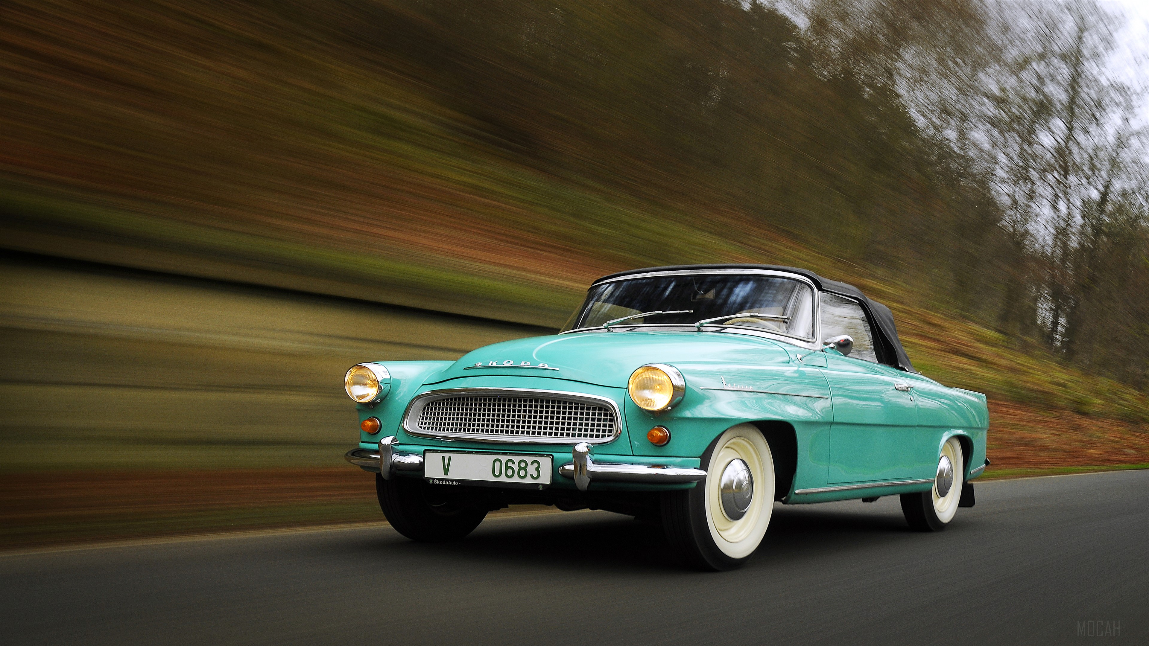 Turquoise Skoda Felicia Convertible driving on a road HD Wallpaper