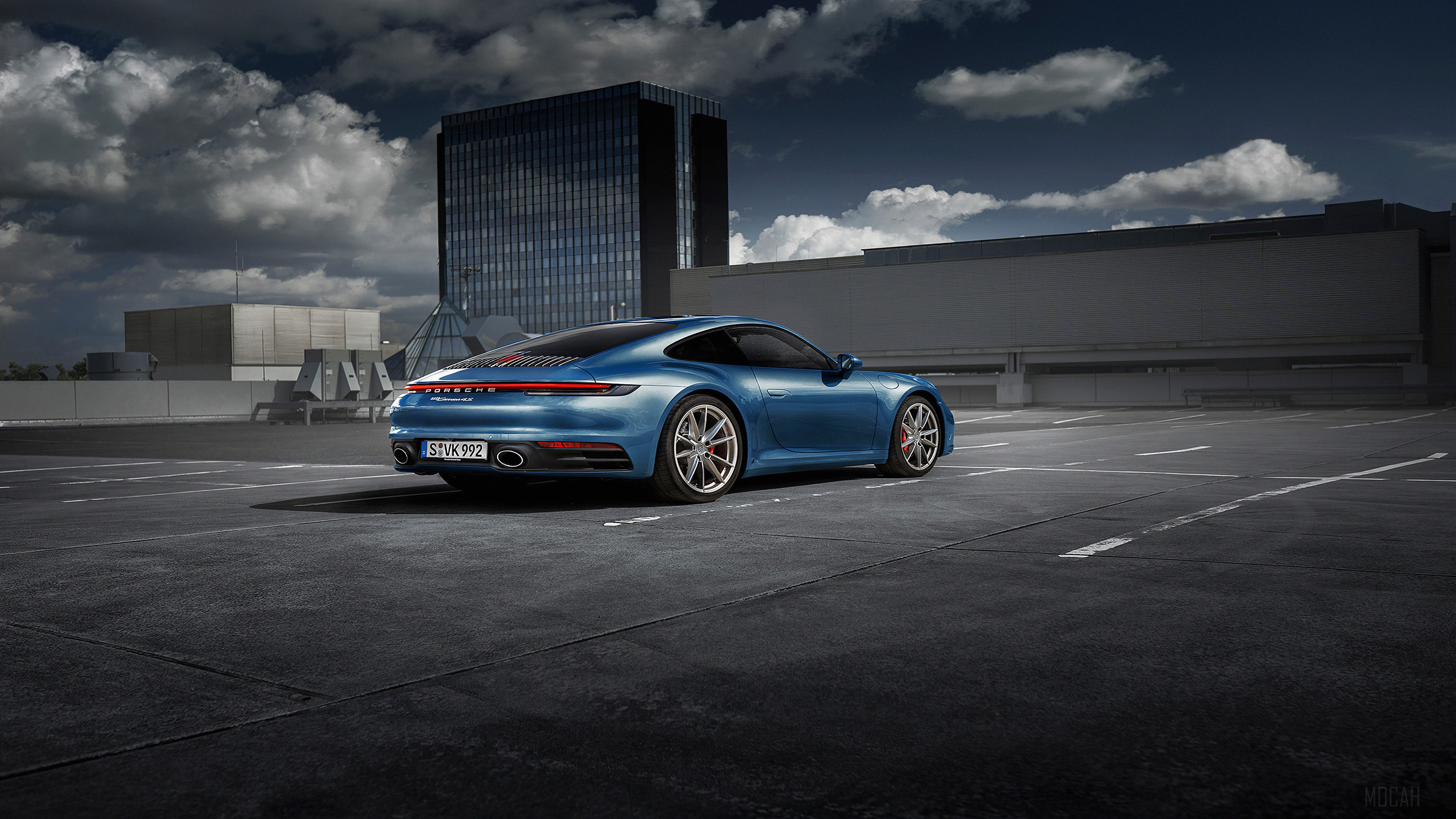 Blue Porsche 911 Carrera 4S parked on rooftop 4K HD Wallpaper
