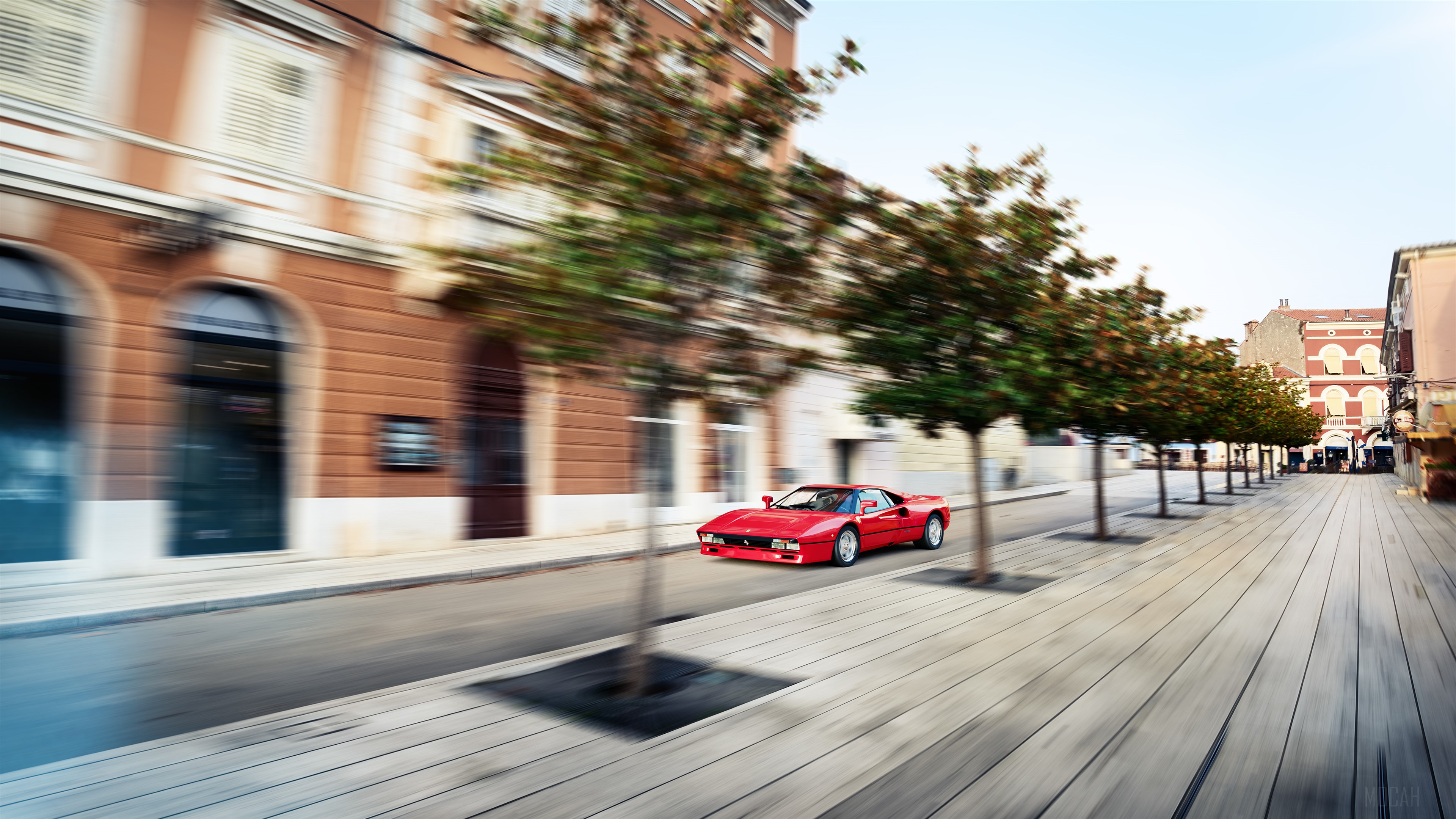 Red Ferrari 288 GTO driving on a street HD Wallpaper