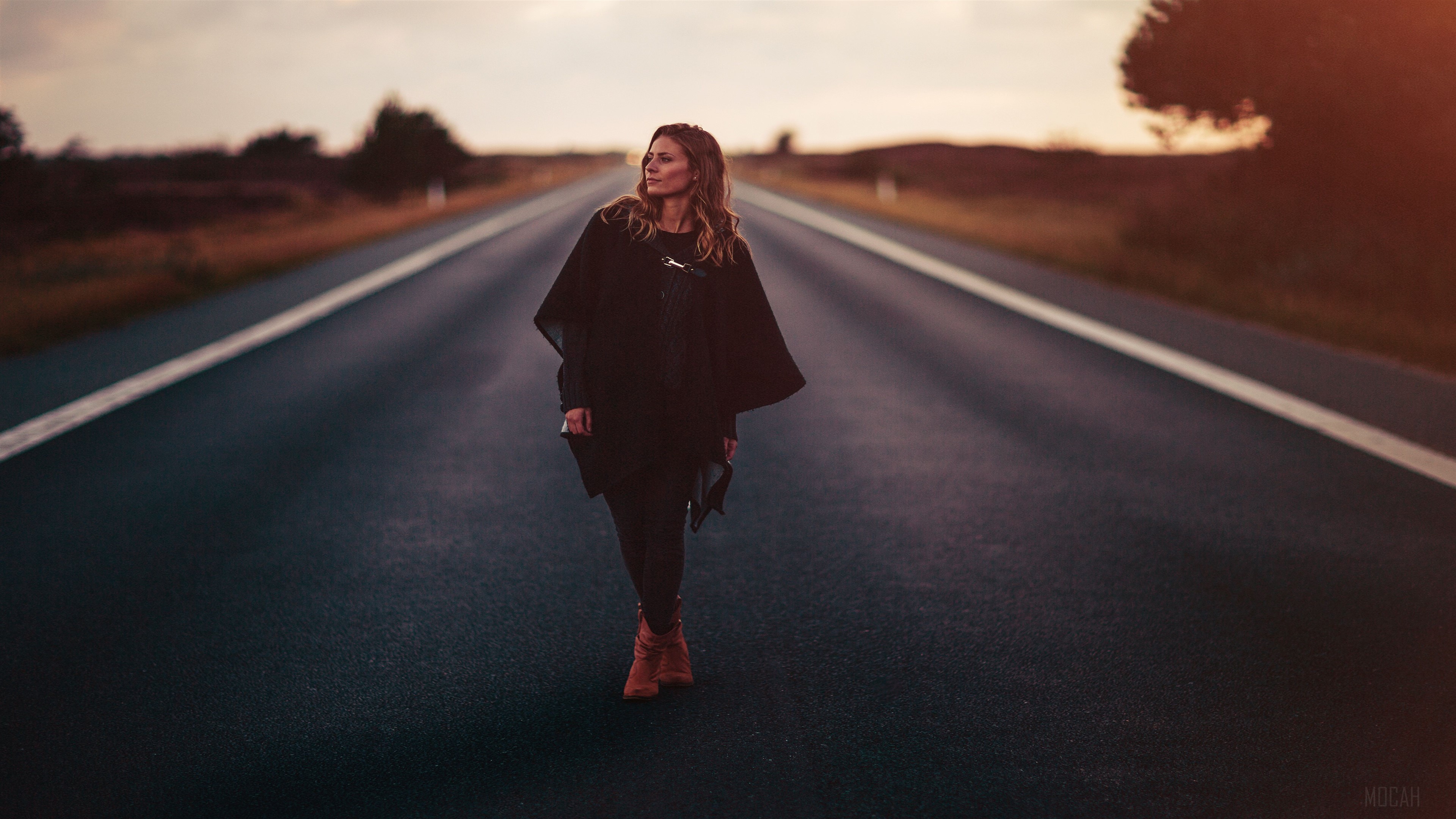 Girl standing on a road at sunset HD Wallpaper