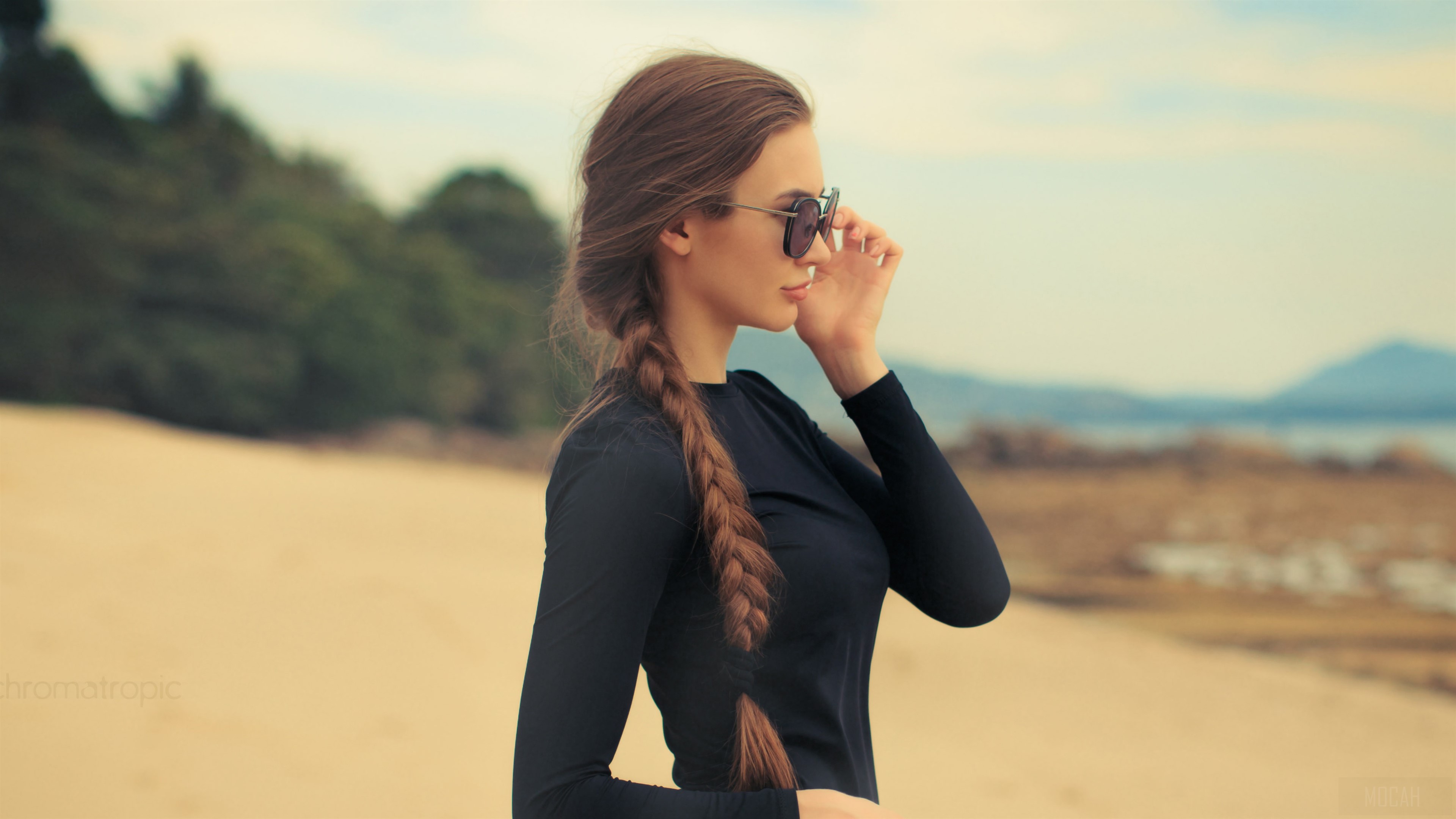 Woman with sunglasses on a beach 4K HD Wallpaper