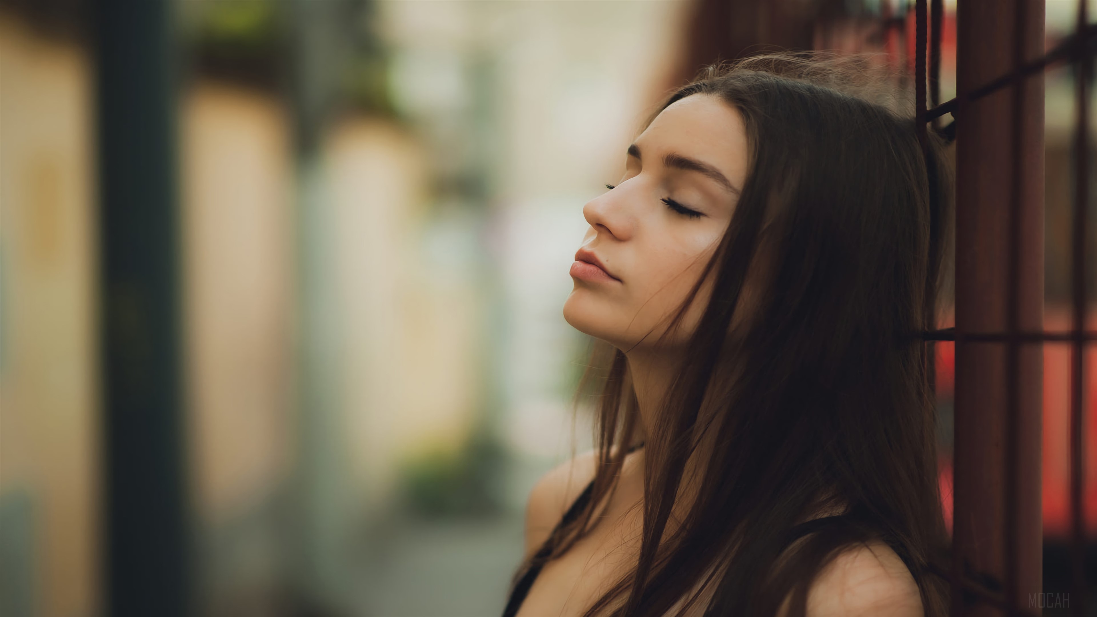 Girl with closed eyes leaning against a fence HD Wallpaper