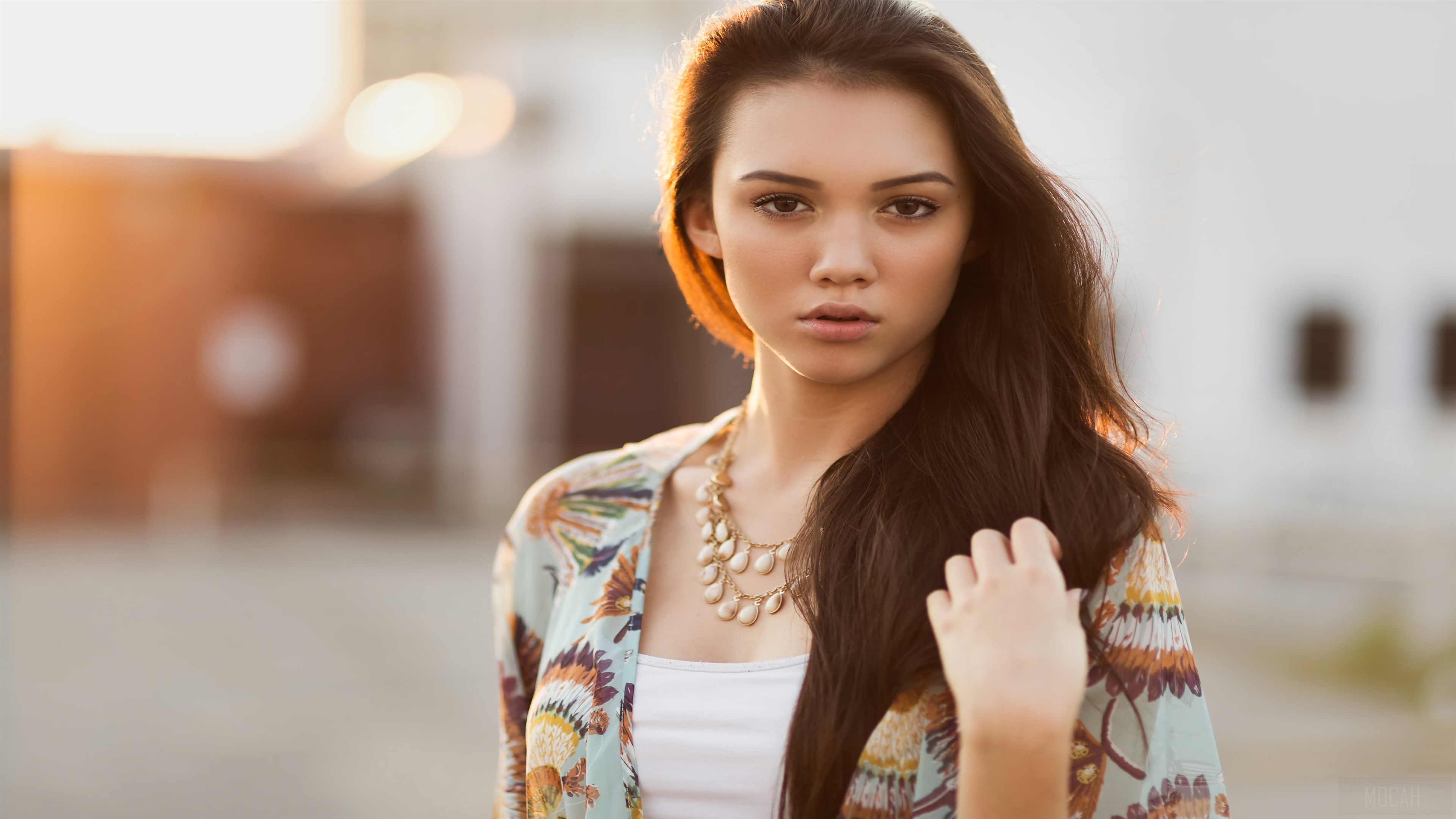 Girl with hands in hair looking at viewer 4K HD Wallpaper