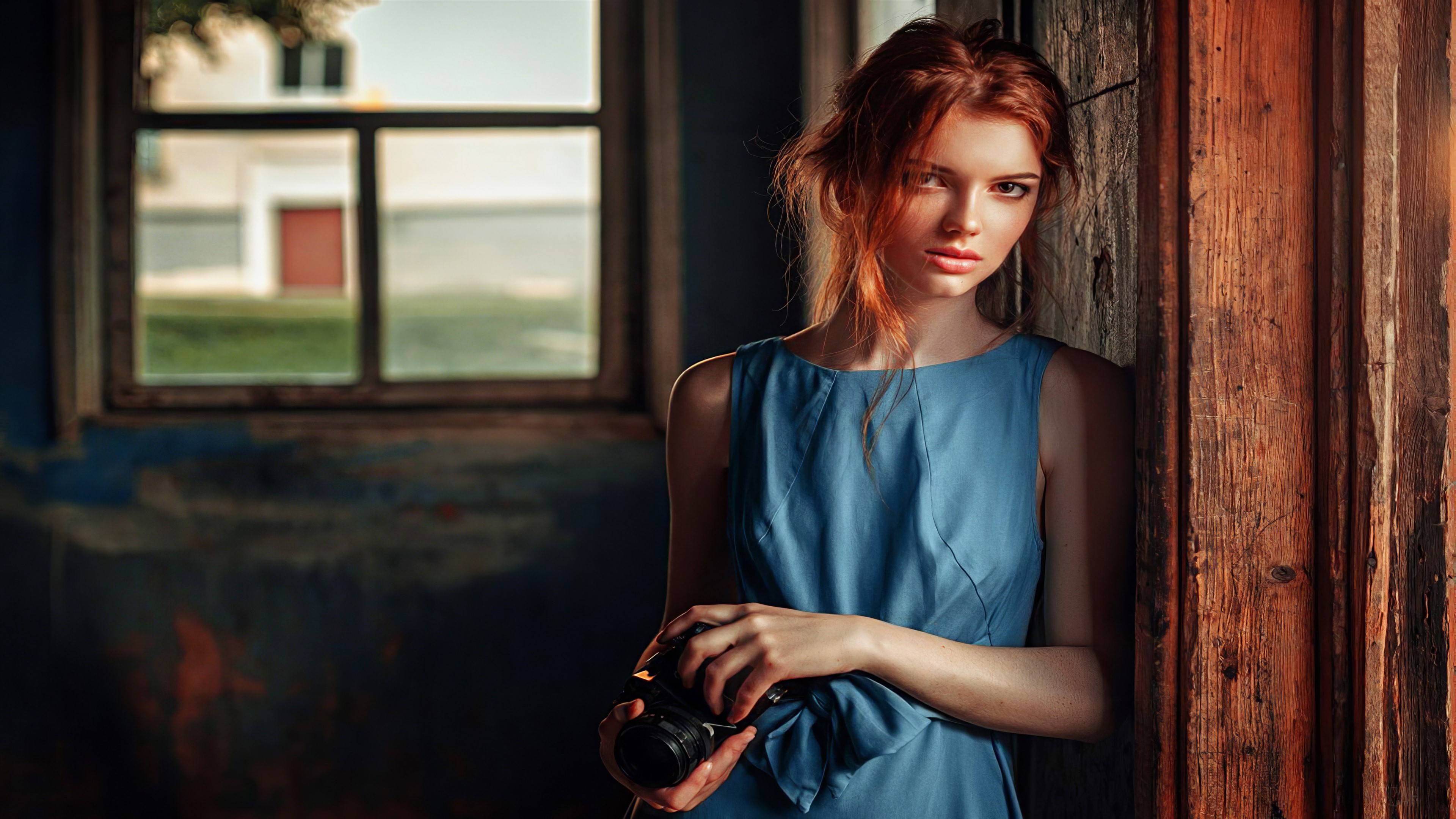 Red Head Girl with Messy Hairs and Camera 4K HD Wallpaper