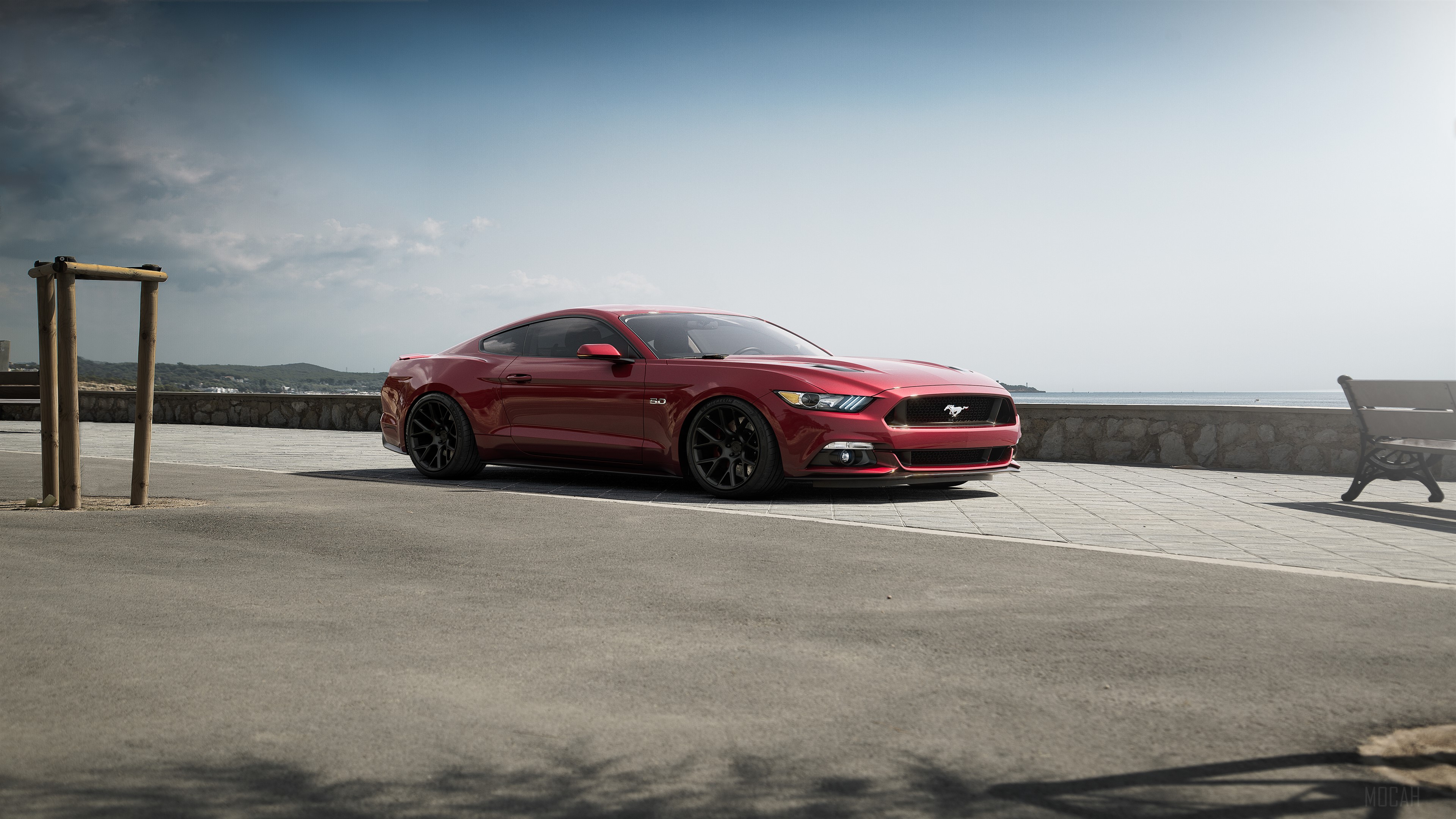 Red Ford Mustang GT parked by the sea HD Wallpaper
