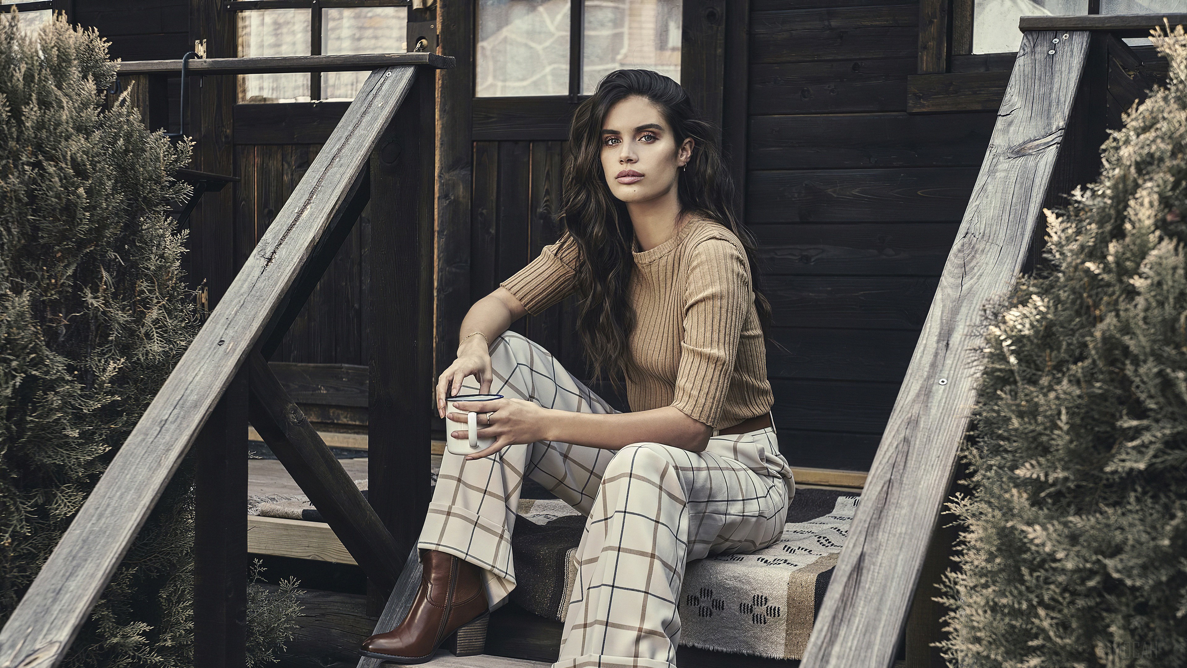Sara Sampaio sitting on steps with coffee mug HD Wallpaper