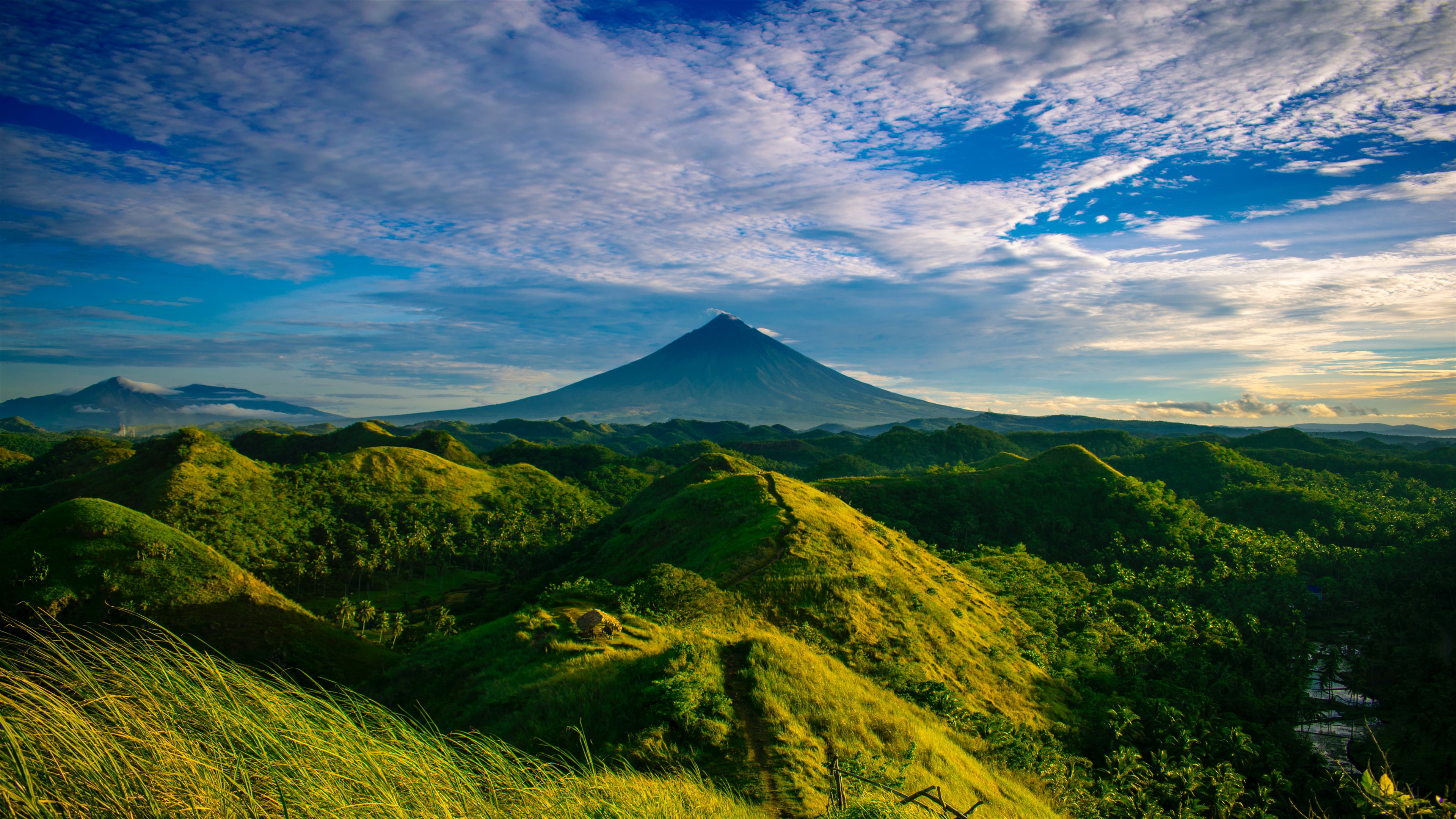 Green Hills under Vibrant Blue Sky 4K HD Wallpaper