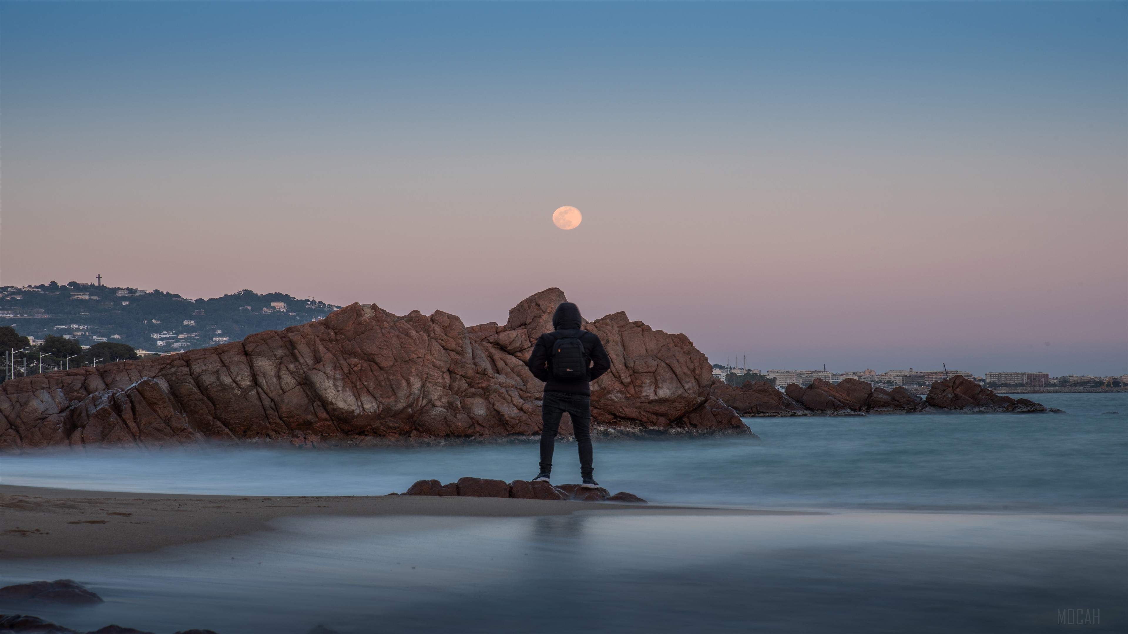 Man overlooking moonlit sea 4K HD Wallpaper