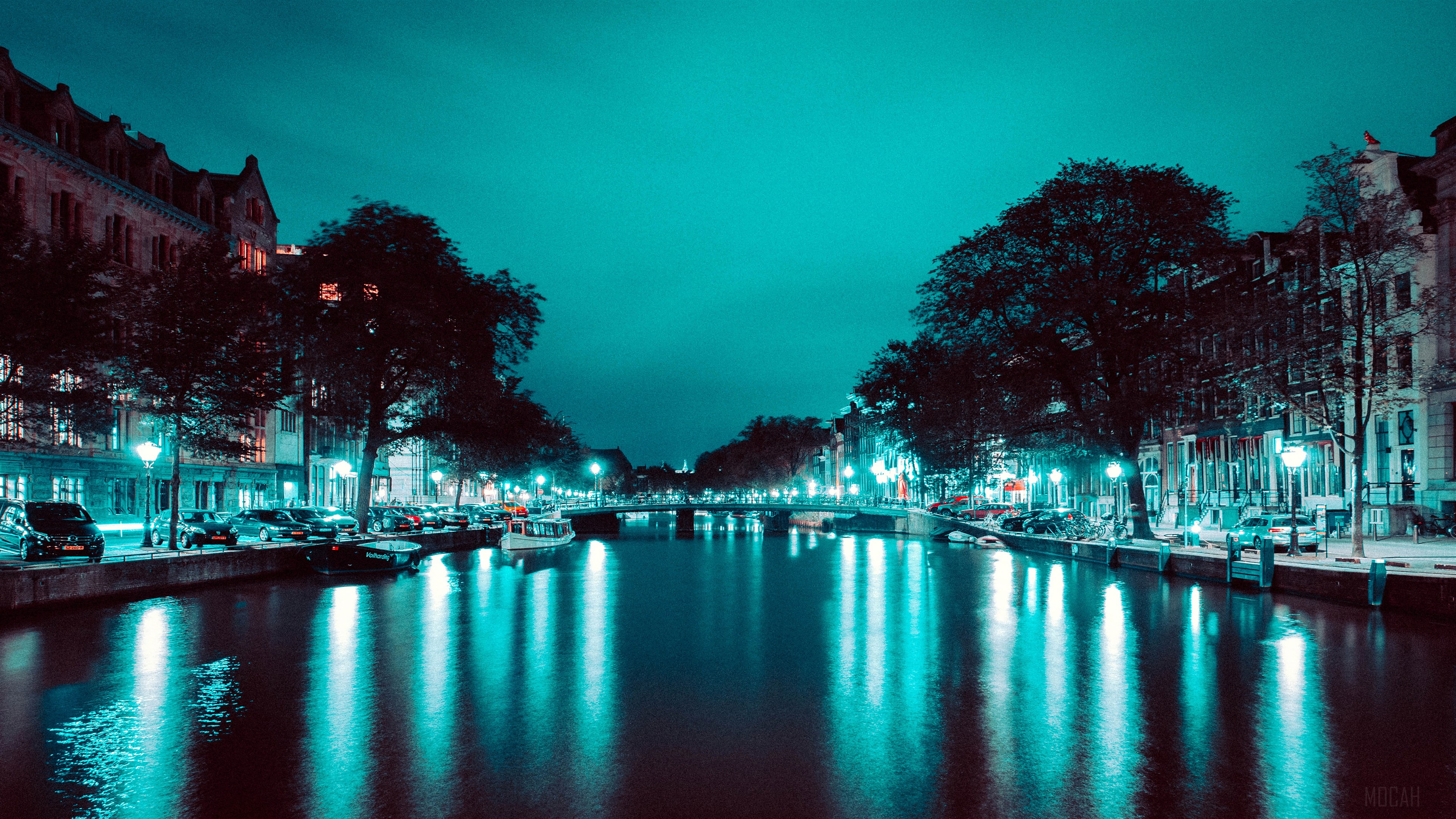 Amsterdam Canal at Night with Bridge and Boats 4K HD Wallpaper