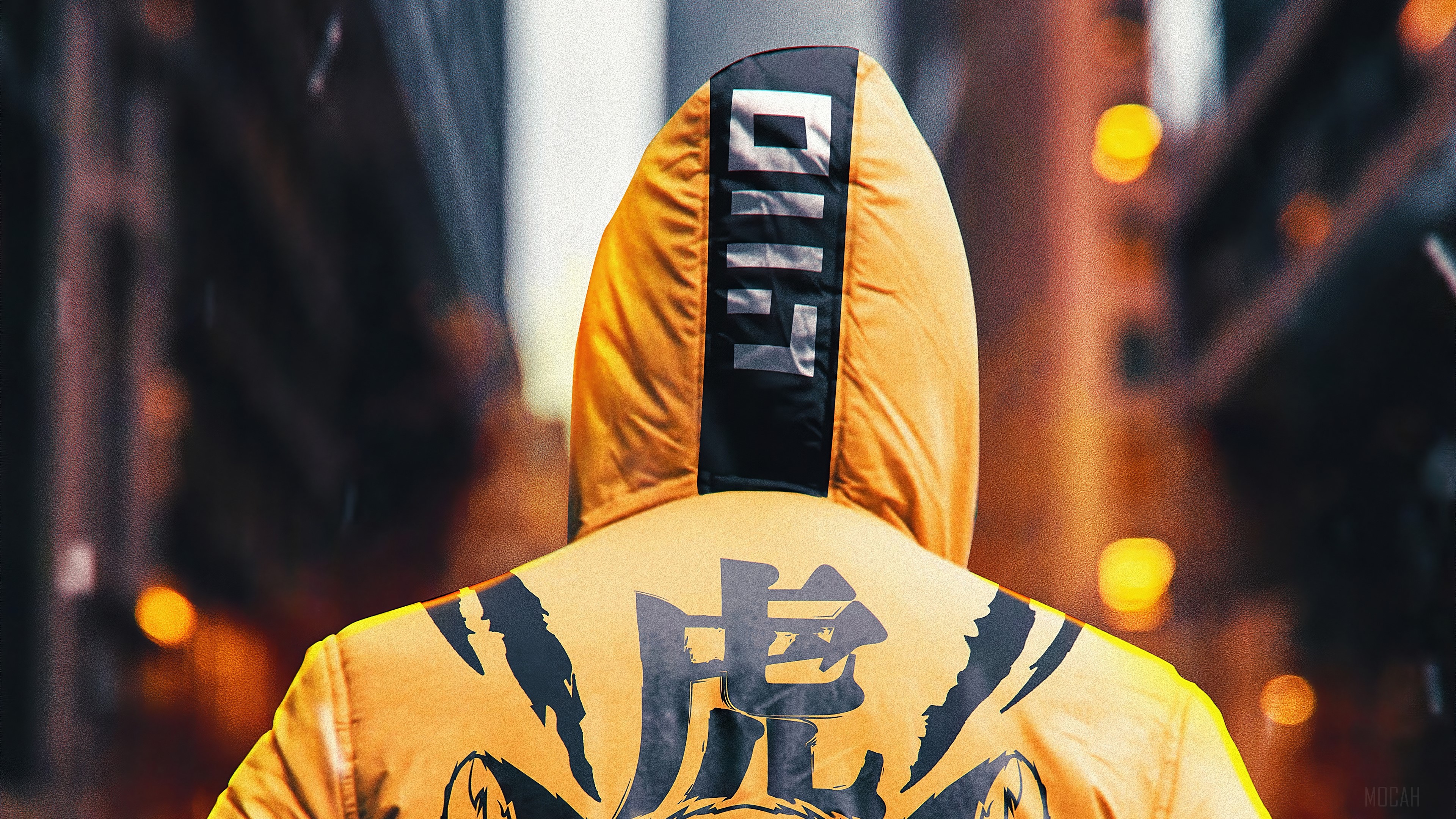 Man in a yellow ninja hoodie with tiger design HD Wallpaper