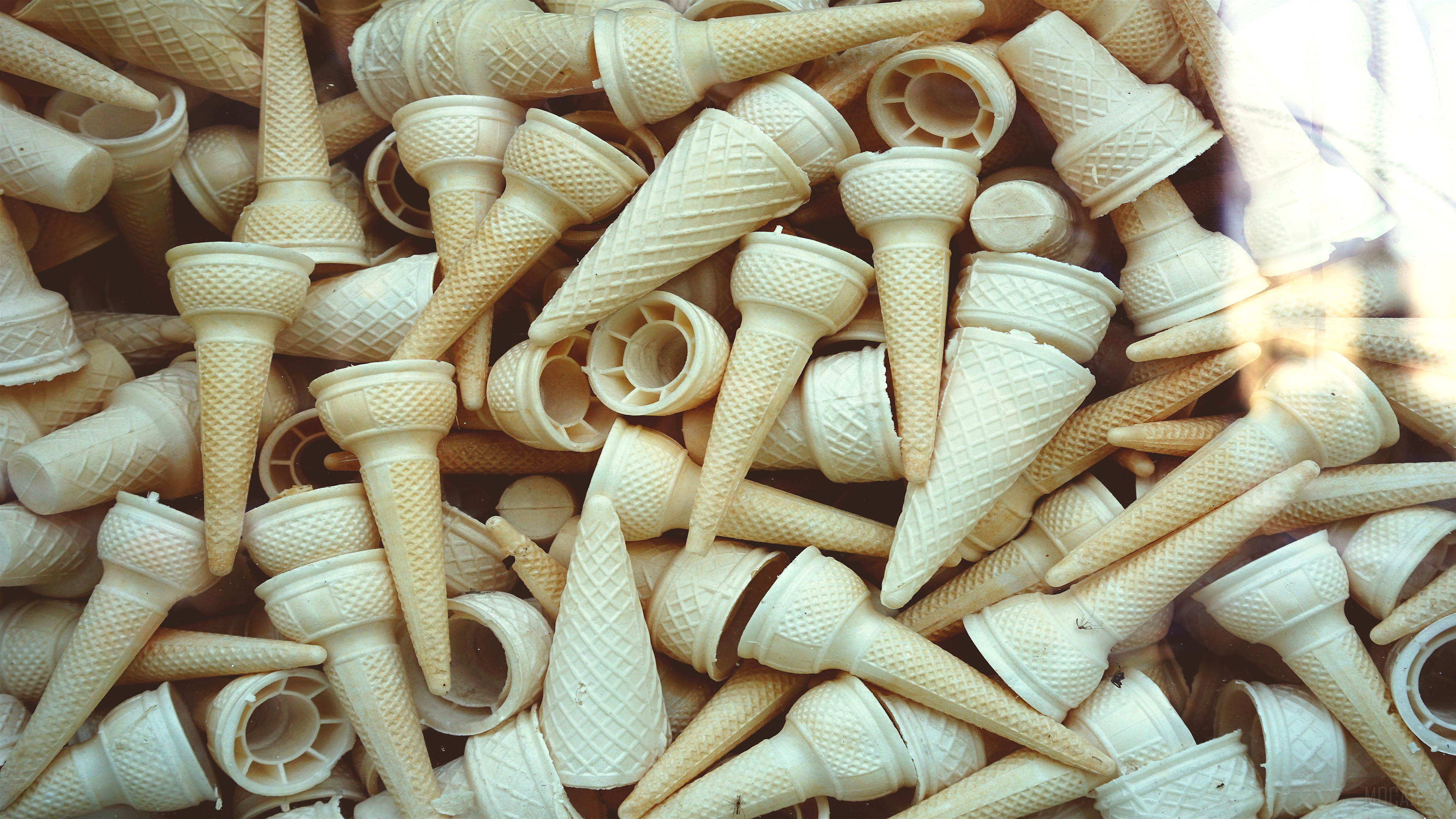 Pile of empty ice cream cones HD Wallpaper
