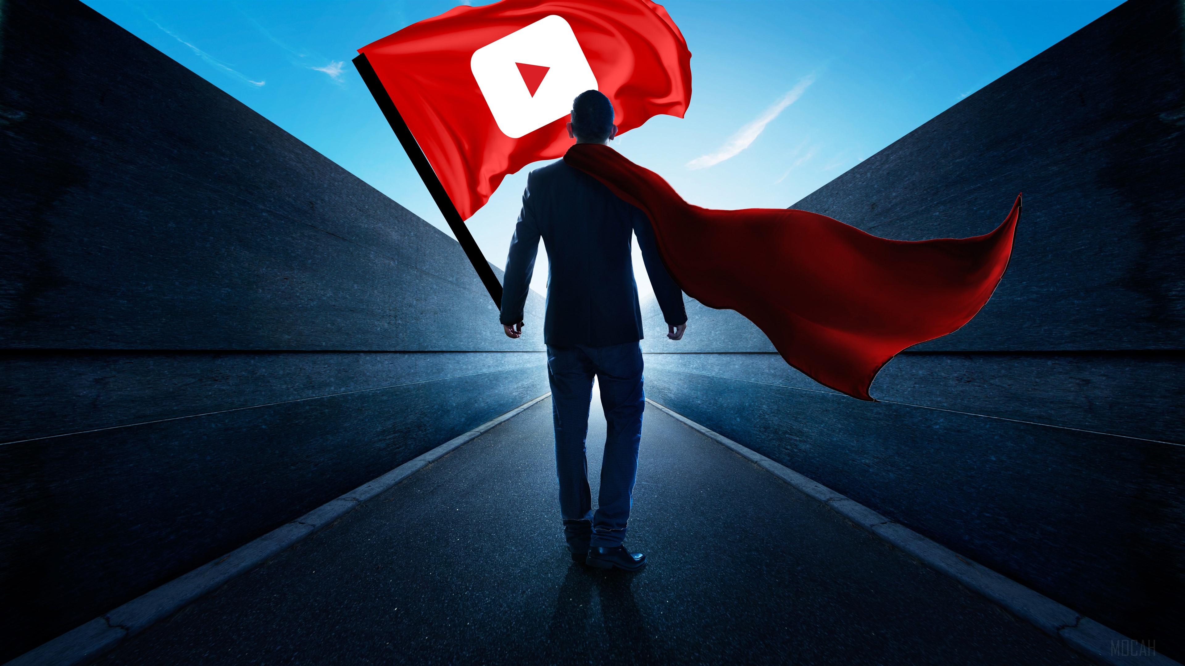 Man holding YouTube flag with red cape 4K HD Wallpaper