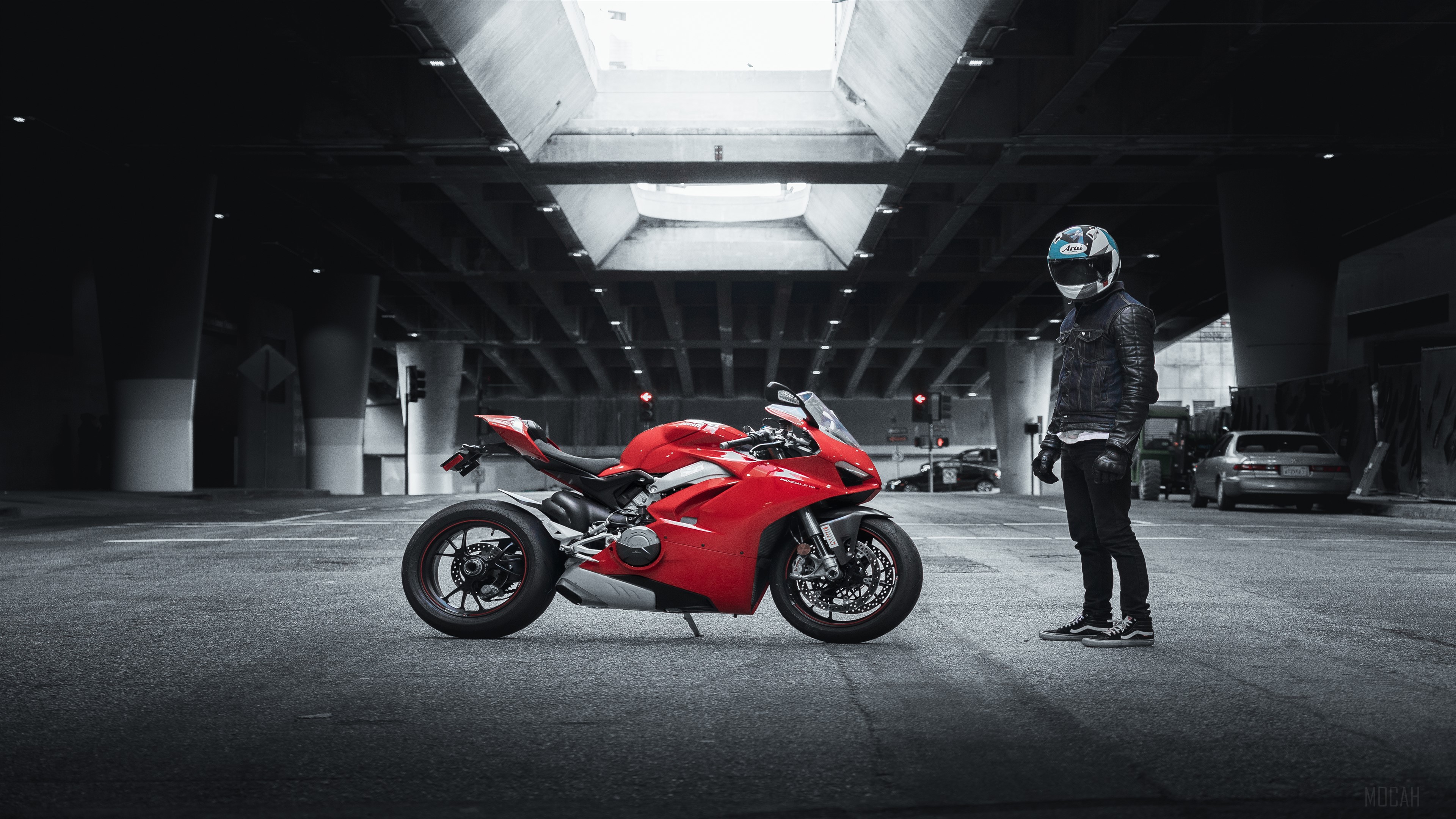 Red Ducati motorcycle with rider under overpass HD Wallpaper