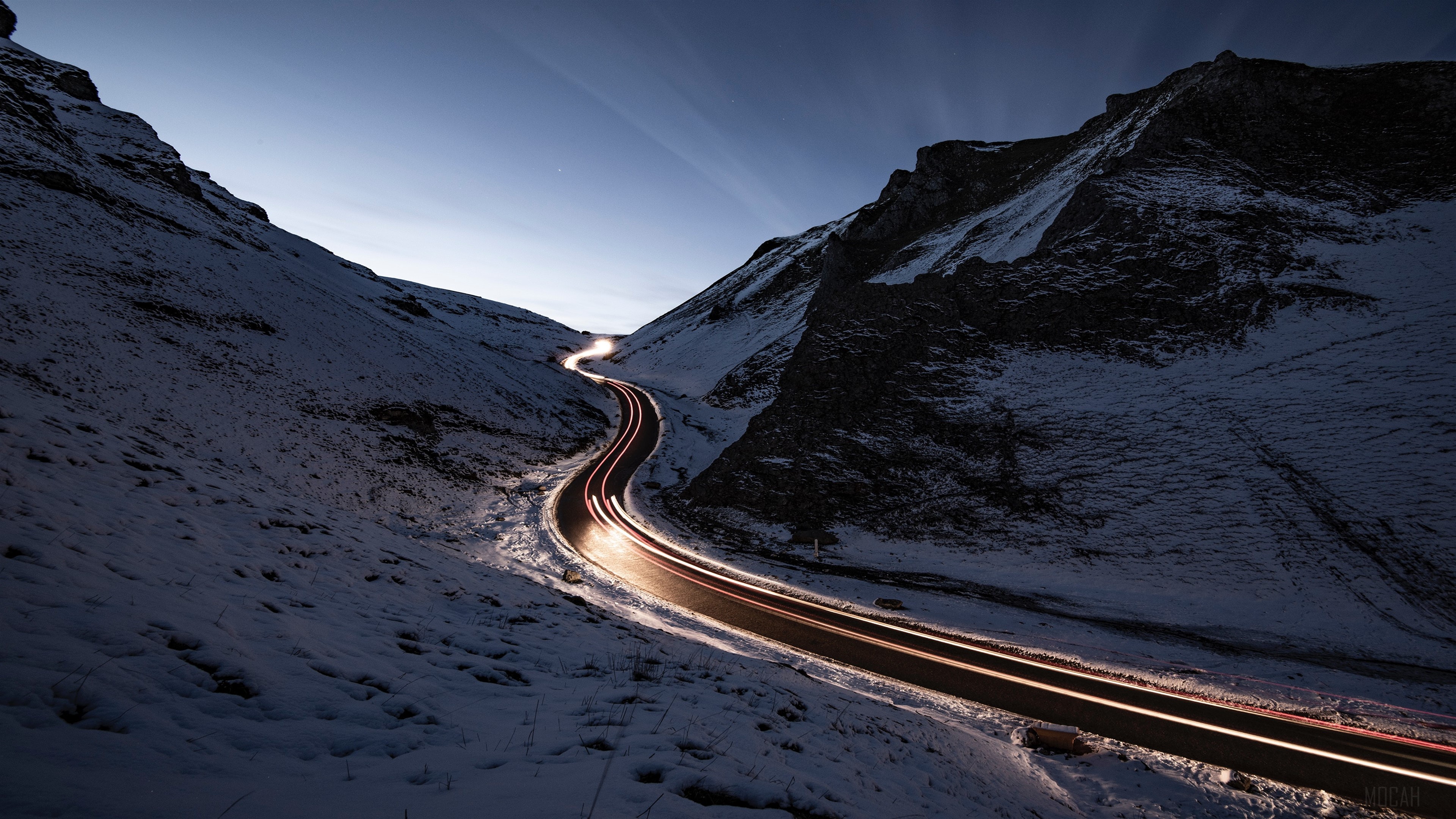 Snowy Mountain Road with Light Trails 4K HD Wallpaper