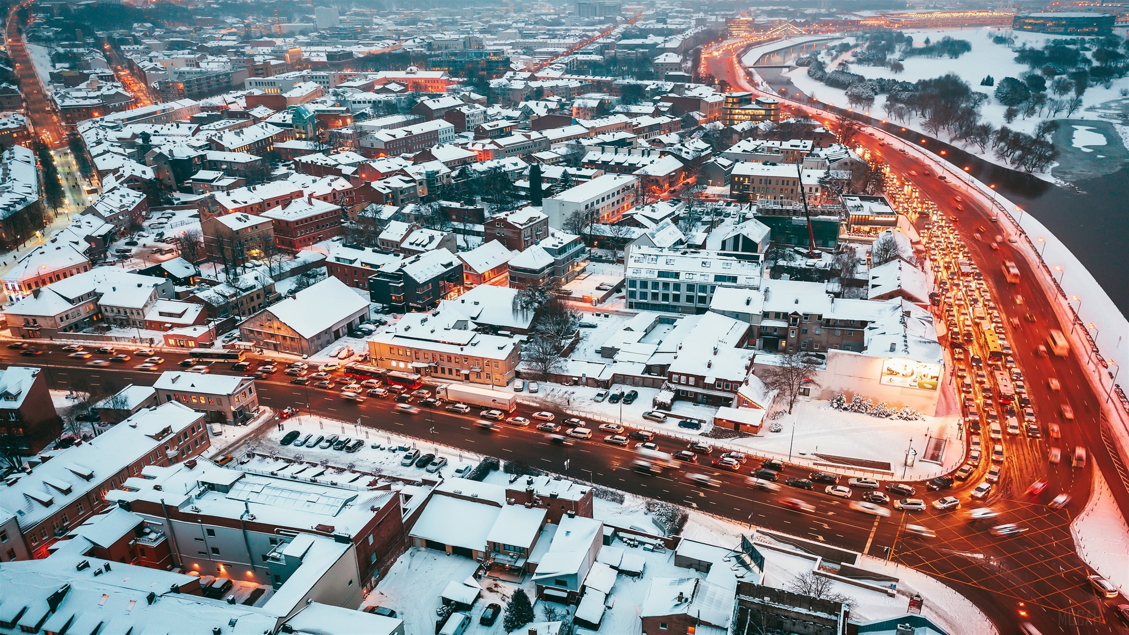 Cityscape Covered in Snow with Traffic HD Wallpaper