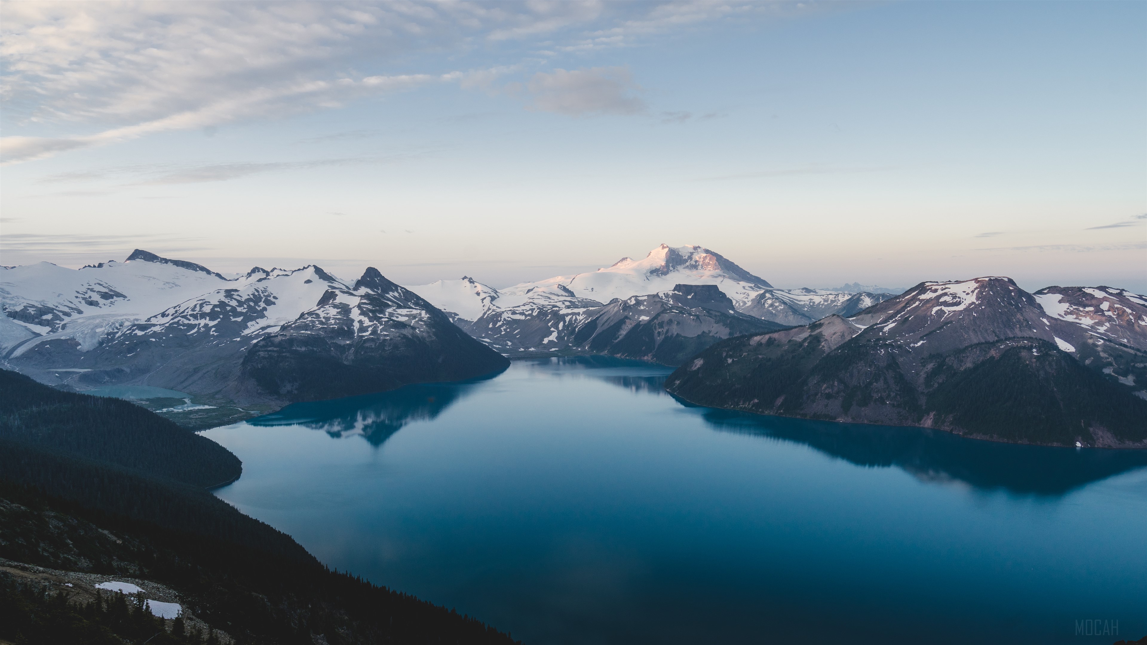 Snow-capped mountains and a lake at sunrise HD Wallpaper
