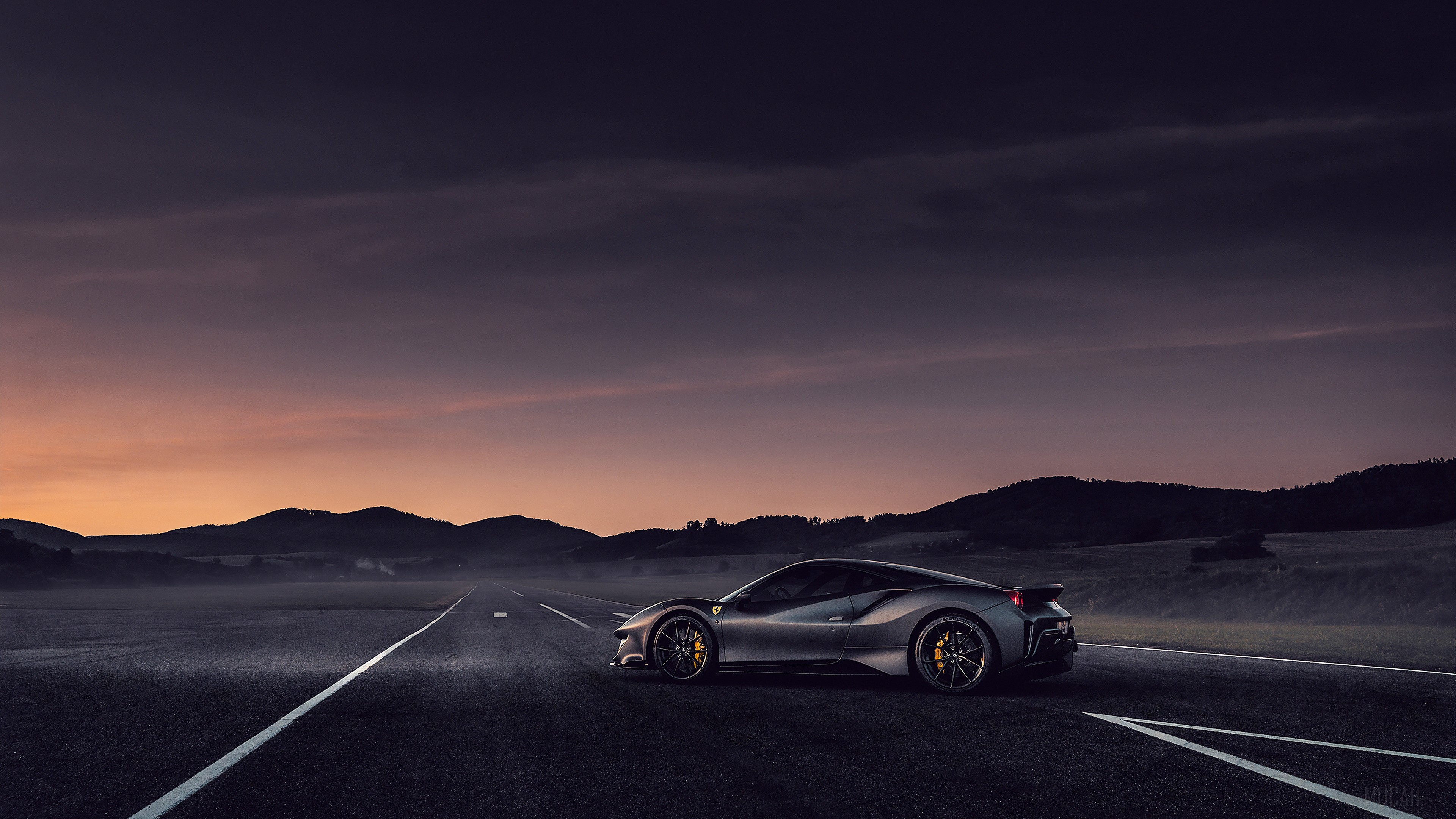 Ferrari on a road at sunset HD Wallpaper