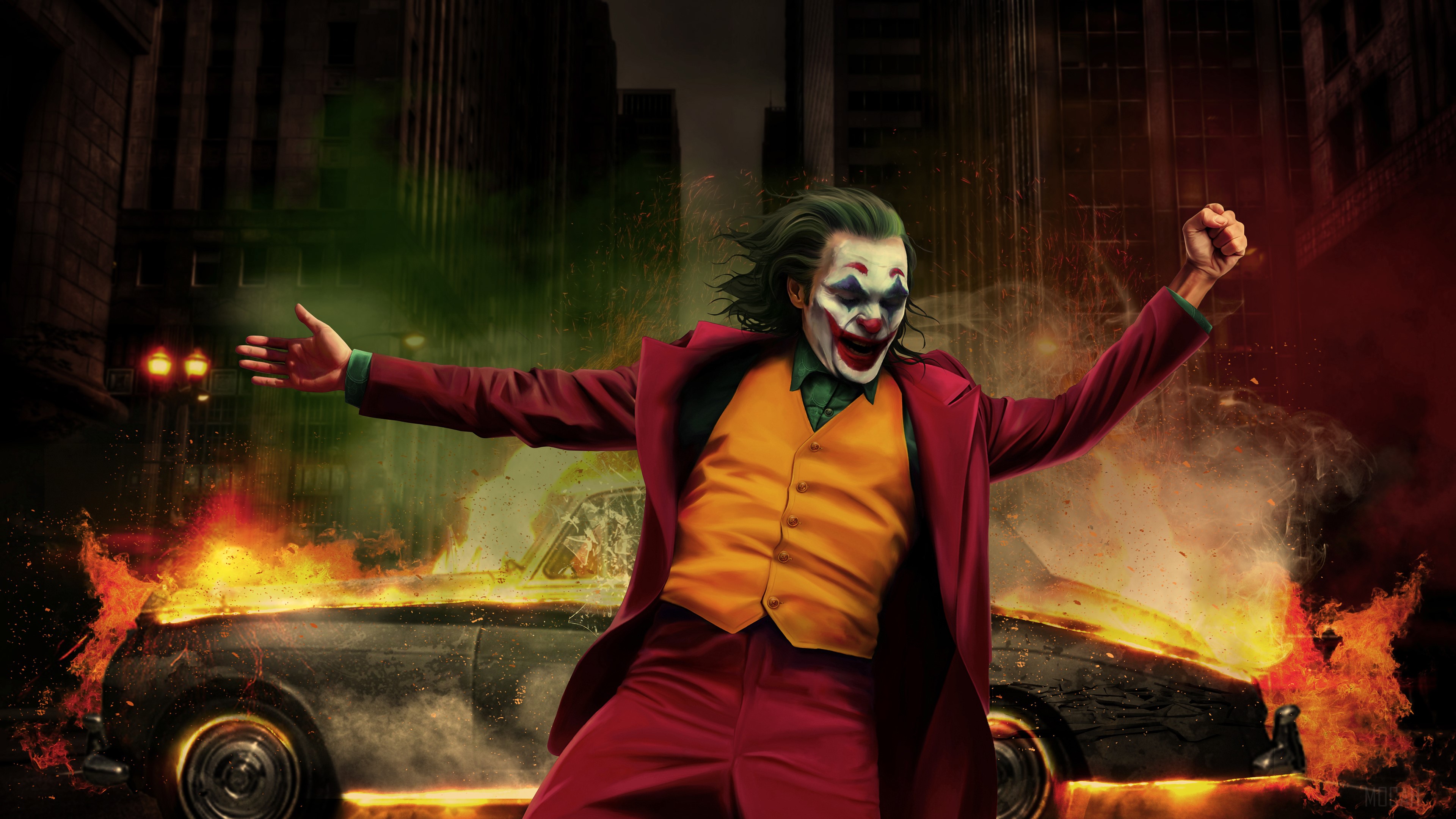 Joker dancing in front of a burning car HD Wallpaper