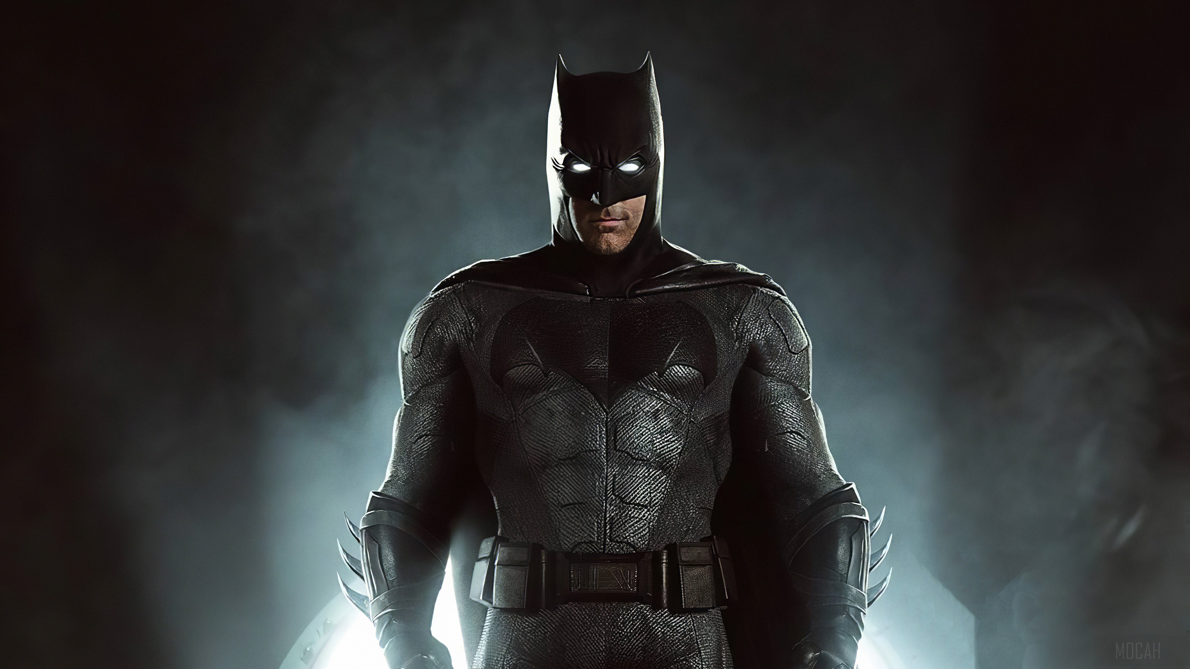 Batman in his suit with glowing eyes HD Wallpaper