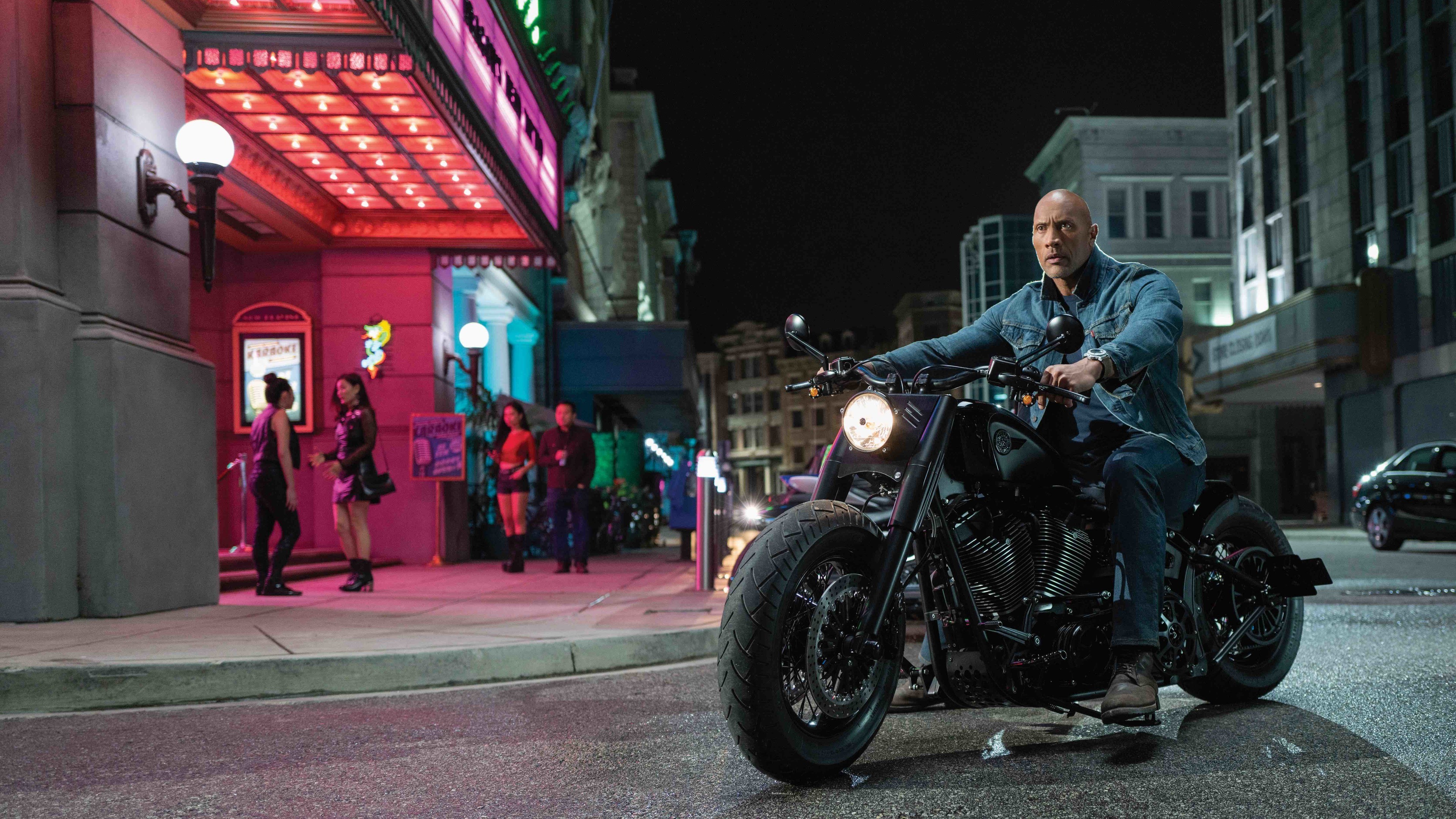 Hobbs on a Motorcycle at Night HD Wallpaper