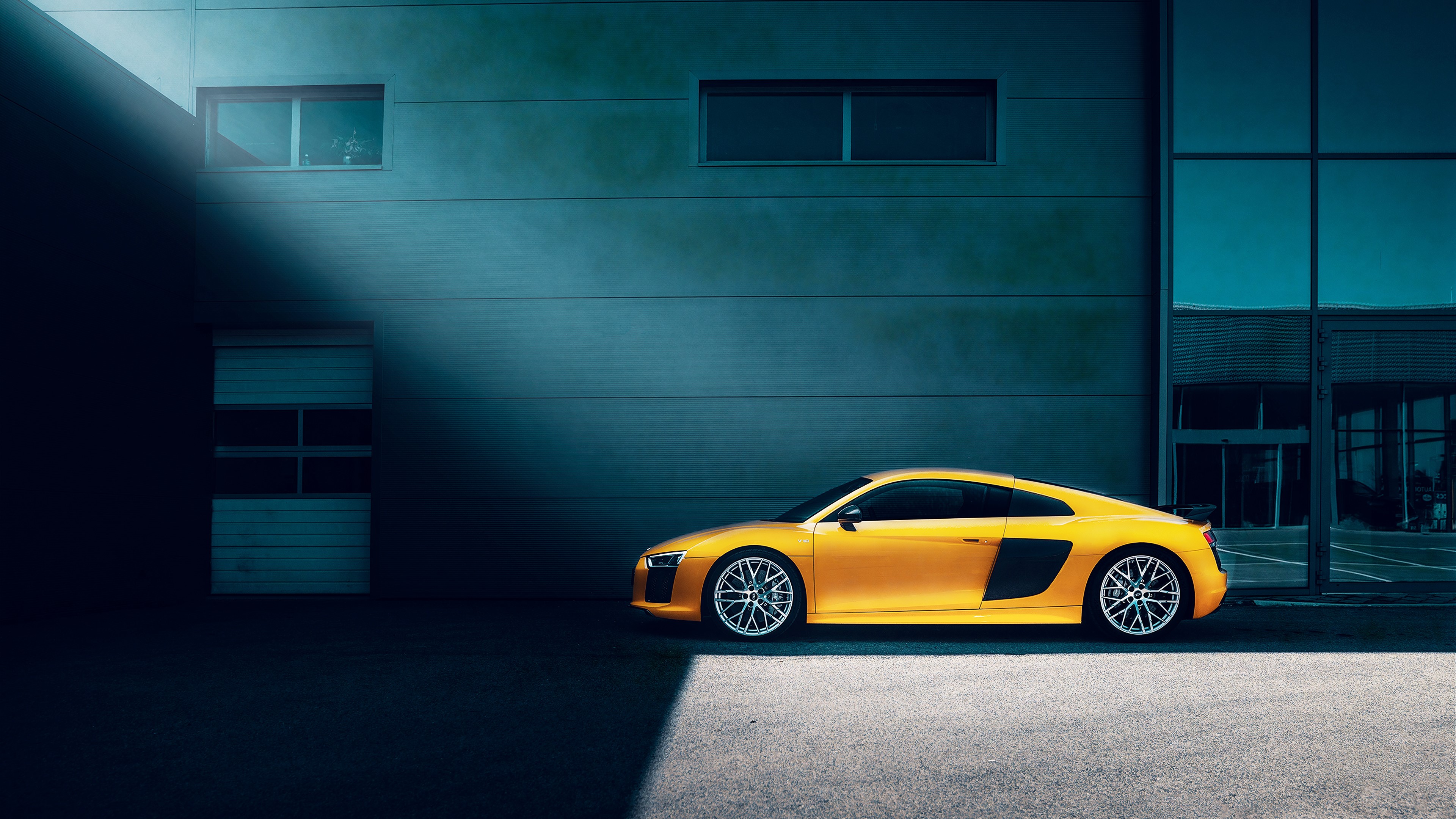 Yellow Audi R8 parked outside building 4K HD Wallpaper