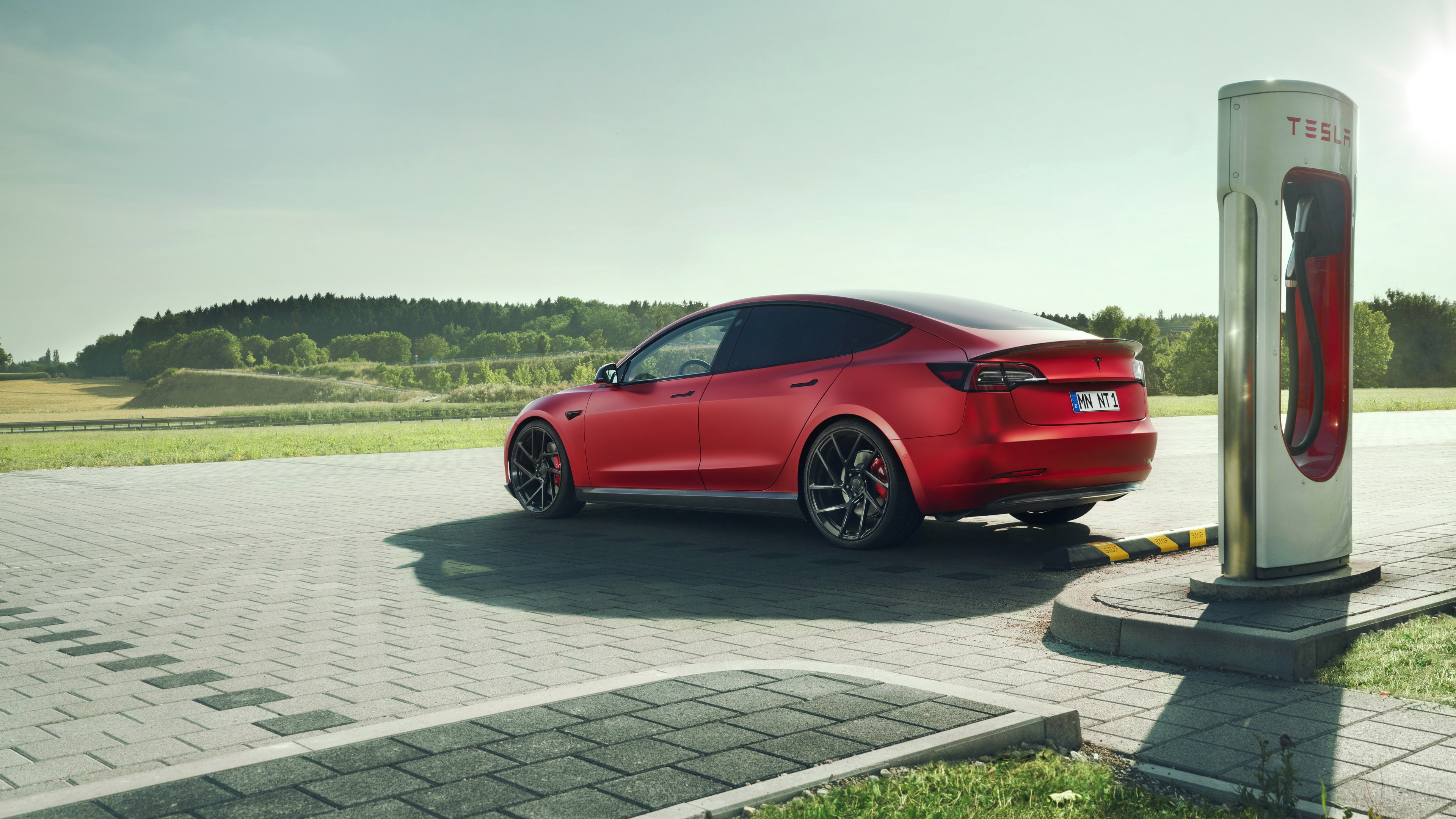 Novitec Tesla Model 3 at Tesla Charging Station 4K HD Wallpaper