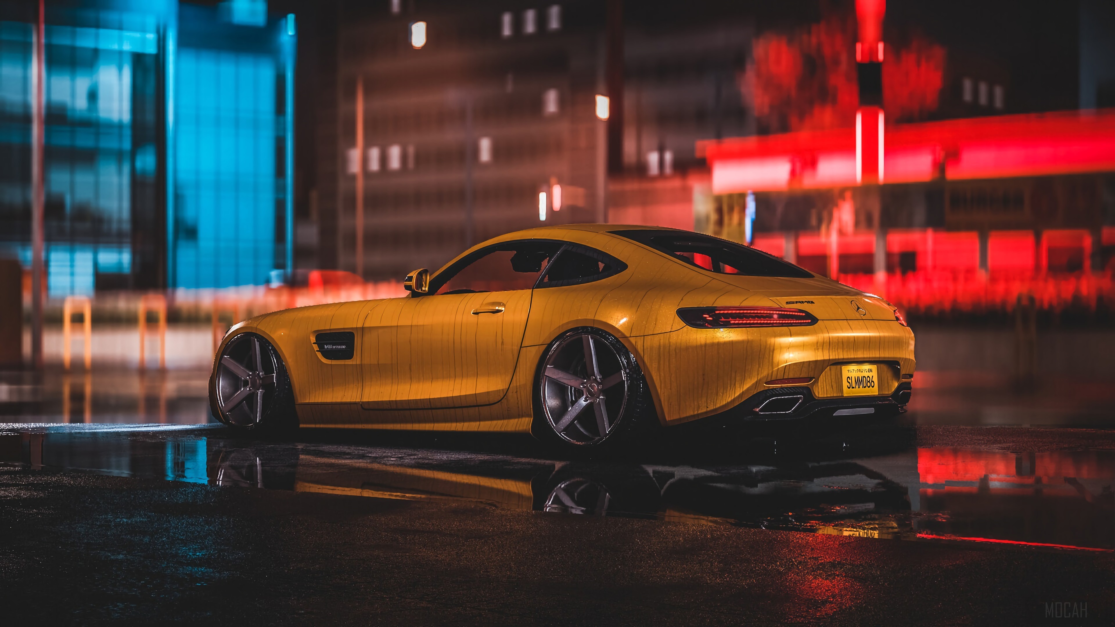 Yellow Mercedes AMG on wet city street at night HD Wallpaper