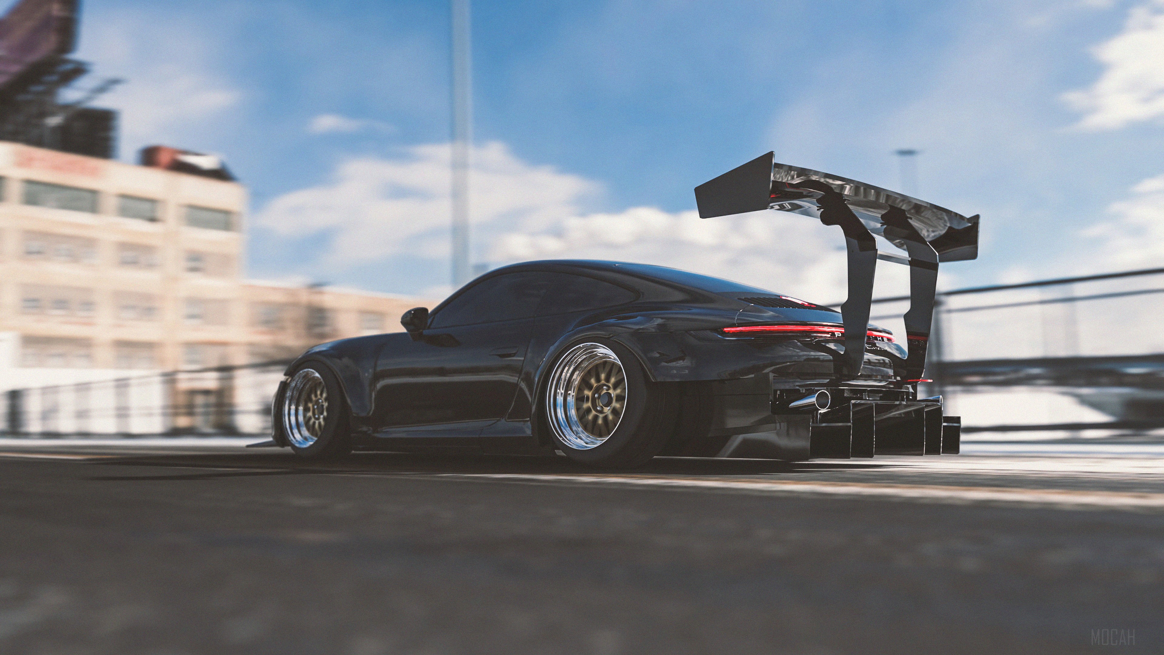 Black Porsche 911 992R with large rear wing 4K HD Wallpaper